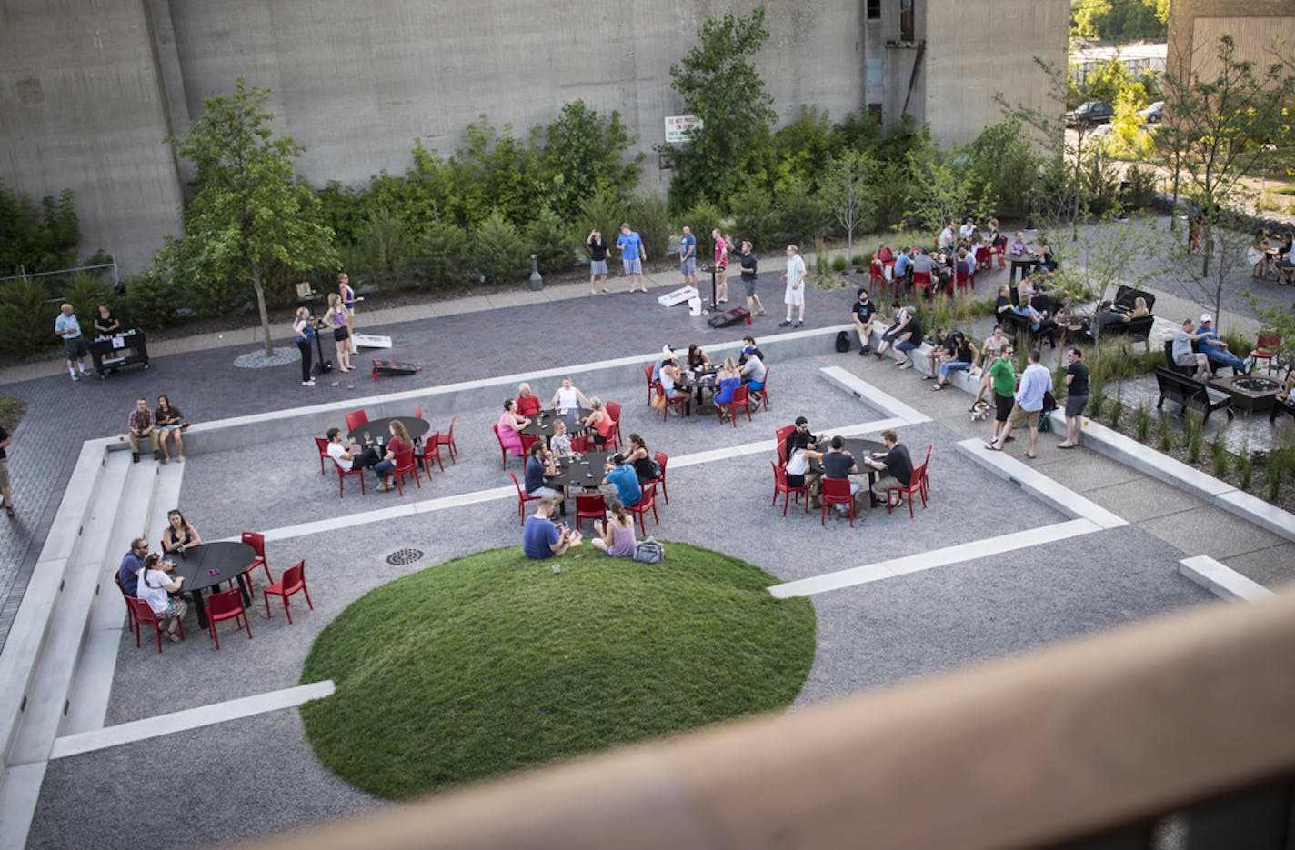 Patrons enjoyed their night in the patio area of Surly on Friday, July 17, 2015. ] Aaron Lavinsky ¥ aaron.lavinsky@startribune.com Restaurant review: Surly Brewing's casual beer hall and more formal Brewer's Table, chef Jorge Guzman's two dining concepts for the destination brewery.