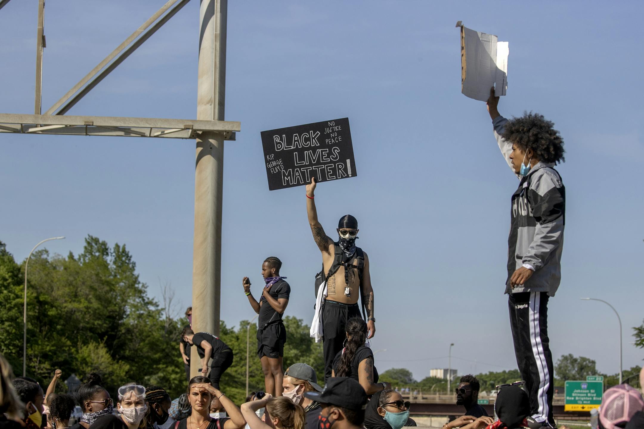 Hundreds of people marched in "No Bail" 10K March that started at US Bank and ended closing the 35W bridge in both directions, Sunday, May 31, 2020 in Minneapolis, MN.
