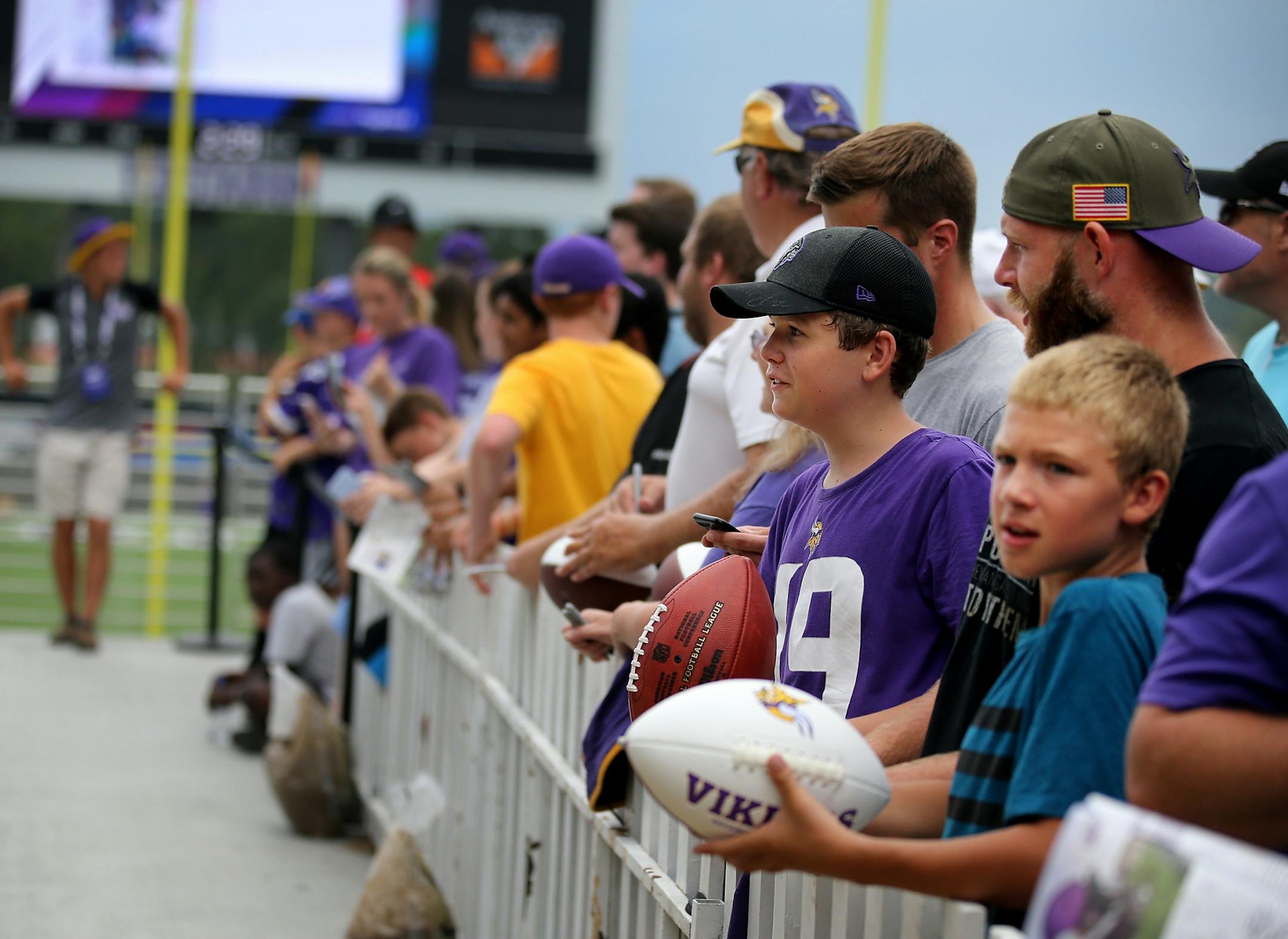 Minnesota Vikings fans look for player autographs before the start of a Vikings and Jacksonville Jaguars joint practice session Thursday, Aug. 16, 2018, at the TCO Performance Center in Eagan, MN.