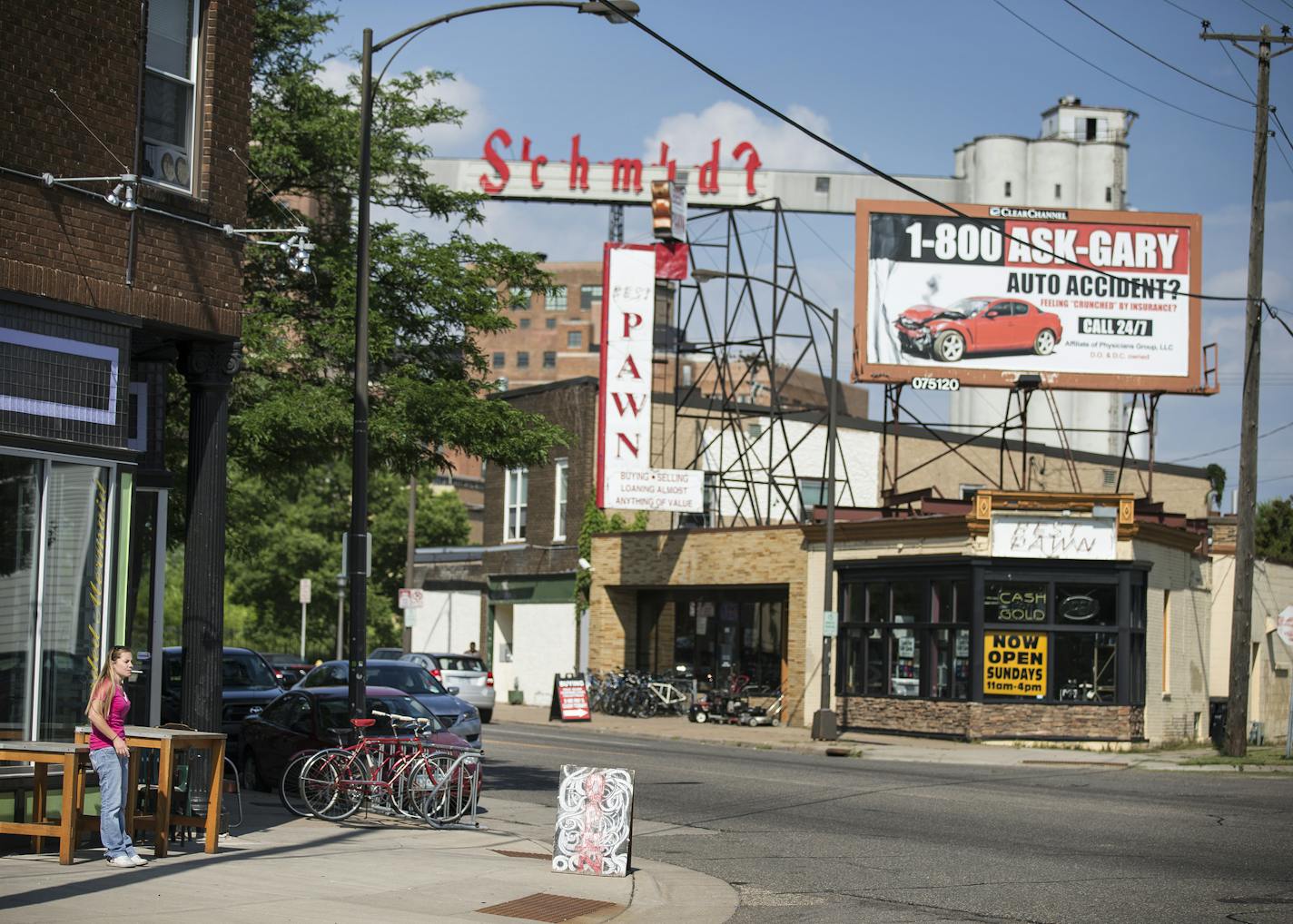 W. 7th Street has become home to artists and a place for unique businesses. Above, the Schmidt Artist Lofts were seen across the street from the Bearded Mermaid Bazaar on the corner of W. 7th Street and W. James Avenue.