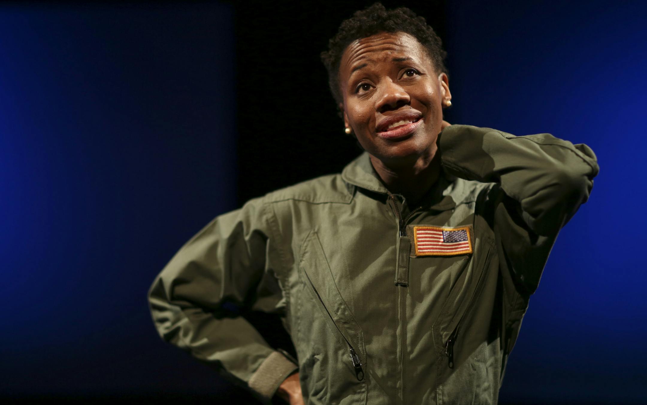 Sha Cage in "Grounded" during a dress rehearsal Monday night. ] JEFF WHEELER ‚Ä¢ jeff.wheeler@startribune.com Sha Cage in "Grounded," is the star and only actor in George Brant's new play about a female fighter pilot whose career is interrupted by a pregnancy. Cage plays a pilot who becomes a drone operator, working in the arid landscape outside of Las Vegas to eliminate bad guys 8,000 miles away in the sands of the Middle East. Wendy Knox of Frank Theatre directed the first run