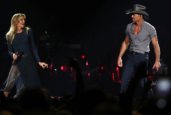 File photo: Country superstar couple Tim McGraw and Faith Hill performed together in St. Paul.