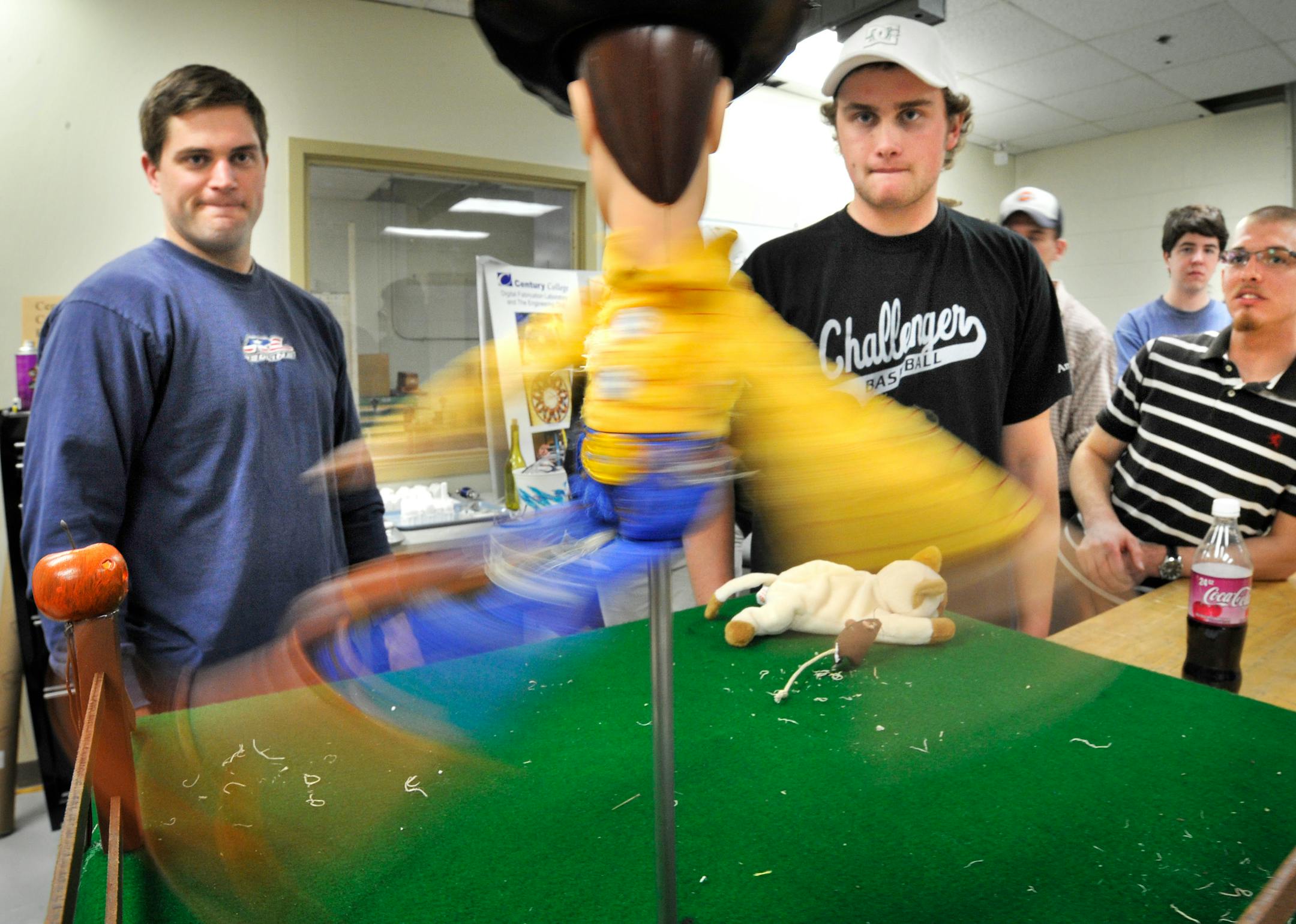 Less crucial to solving world problems, but still an innovative piece of engineering, was this automated toy that was created using a "Toy Story" character, a cat and a mouse, designed by Century College students. The specialty lab is run by five technicians/professors.