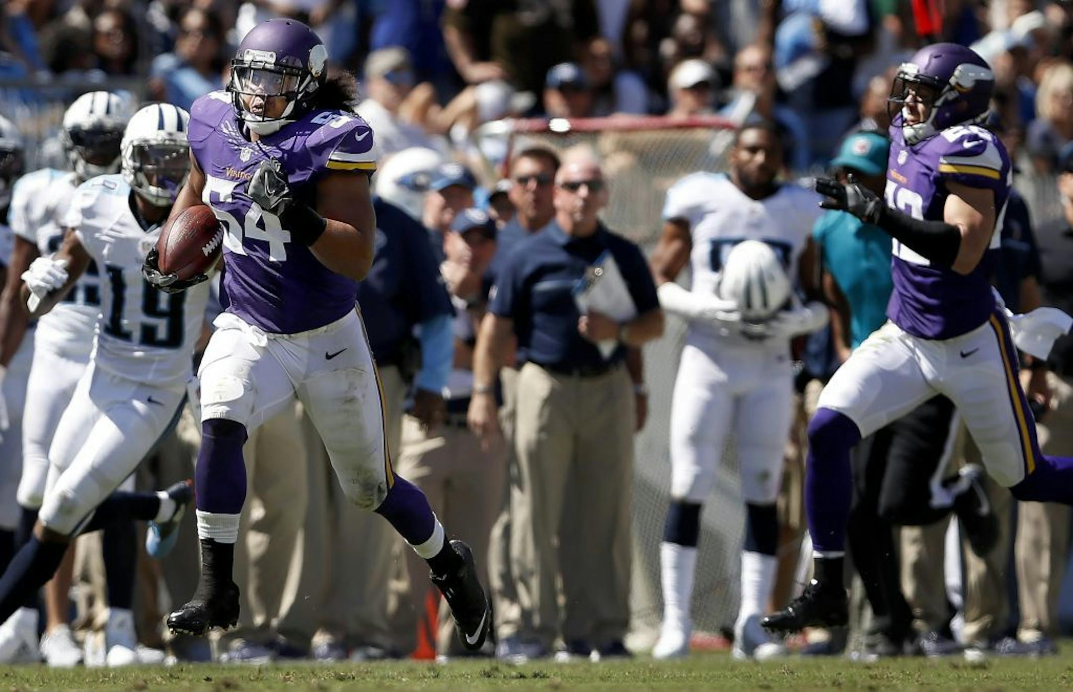 Eric Kendricks return an interception 77-yards for a touchdown in the third quarter.