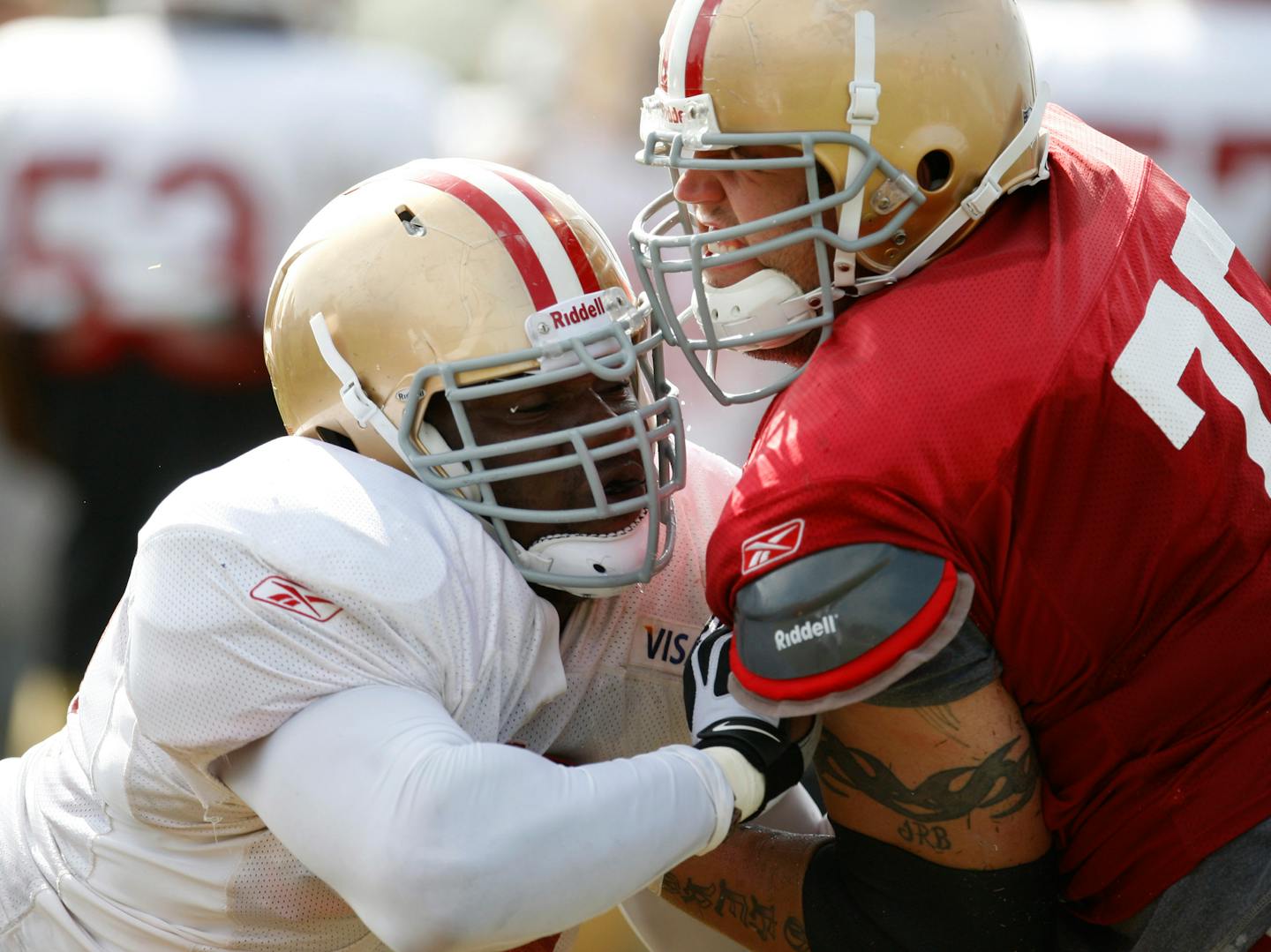 San Francisco 49ers guard Alex Boone (75), right, participates in a drill during training camp in Santa Clara, Calif.