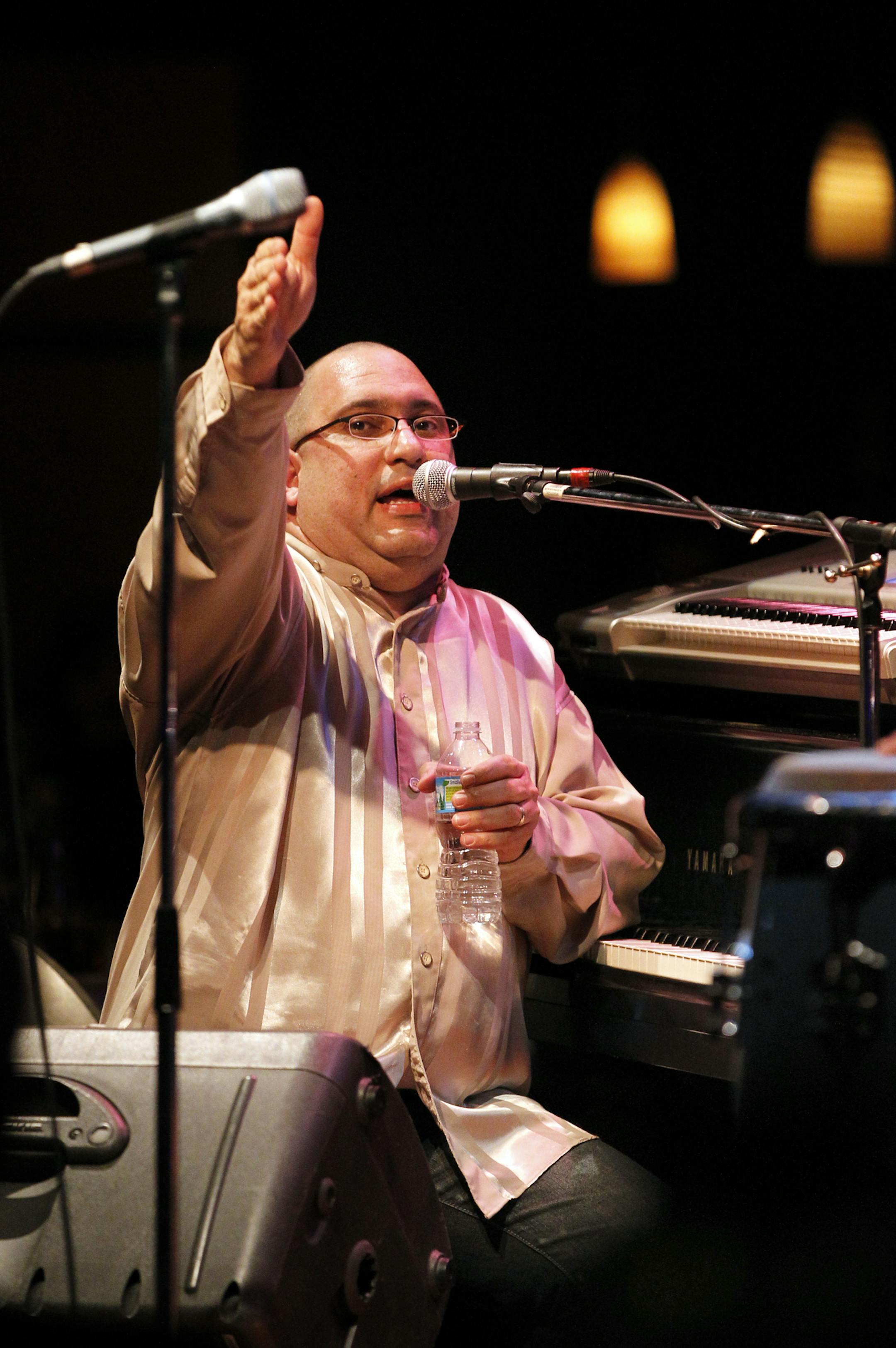 TOM WALLACE • twallace@startribune.com Assignments #20016728A_ Feb 25, 2011_ SLUG: locals02xx_ Nachito Herrera, Cuban born Jazz pianist, played two long sets for the local Dakota Jazz Club crowd _ IN THIS PHOTO:] Nachito Herrera, Cuban born Jazz pianist, played two long sets for the local Dakota Jazz Club crowd. His Band included Yohannes Tona, Bass, Raul Pineda, drums, Guest Rolando Alvarado, Congas and his daughter Mirdalys Herrera working her vocals.