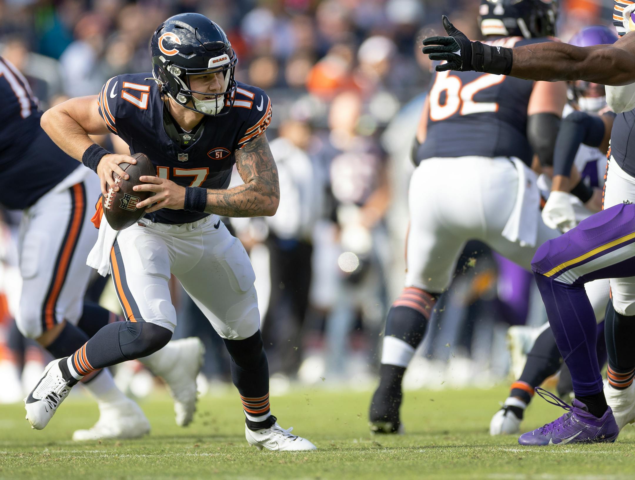 Chicago Bears quarterback Tyson Bagent (17) is pressured in the fourth quarter.