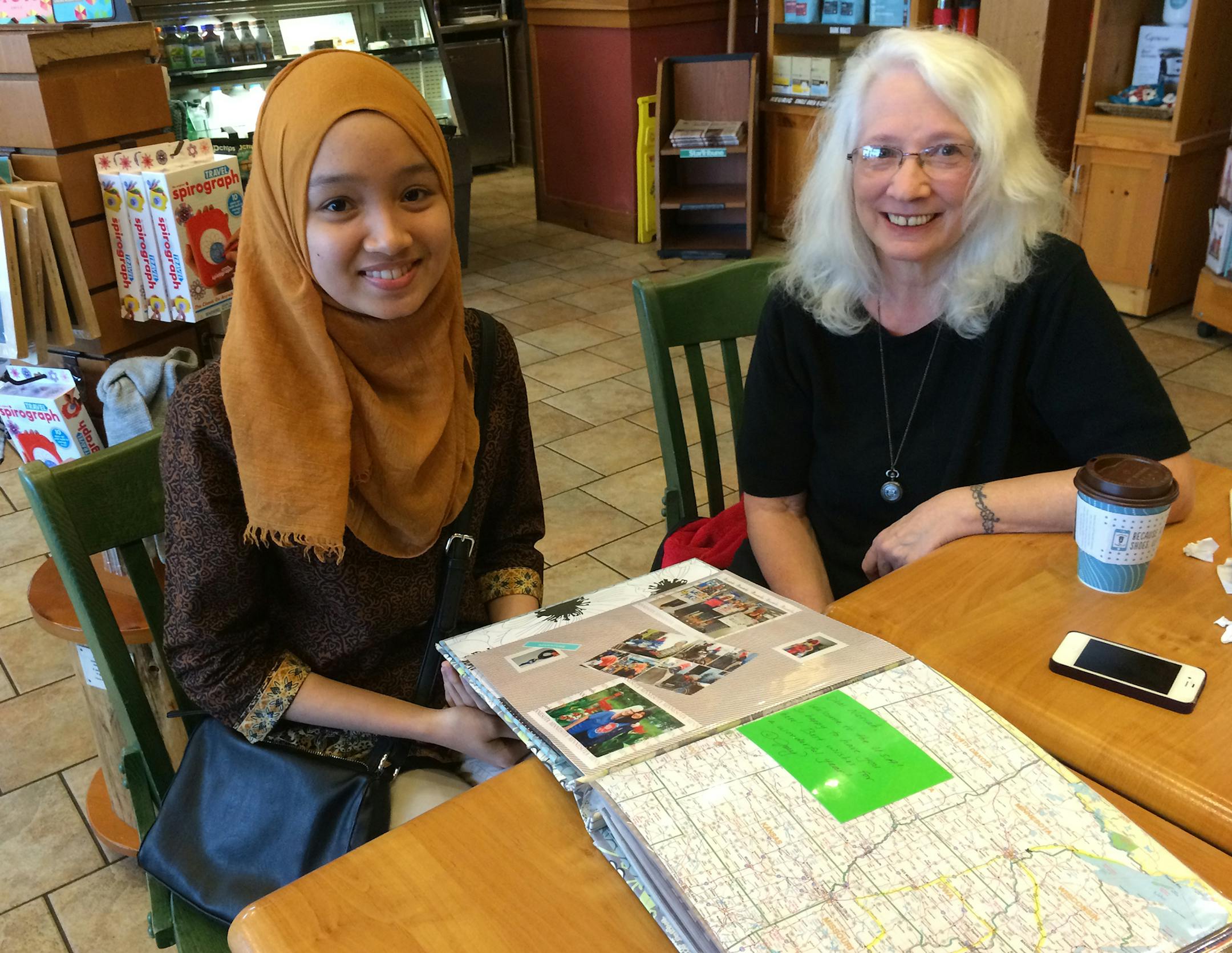Gail Rosenblum / Star Tribune Nariah Haer, 17, with scrapbook of her American adventures. Being an exchange student, she said, "was life-changing." Pictured with host mom Brenda Lundblad of Rush City.