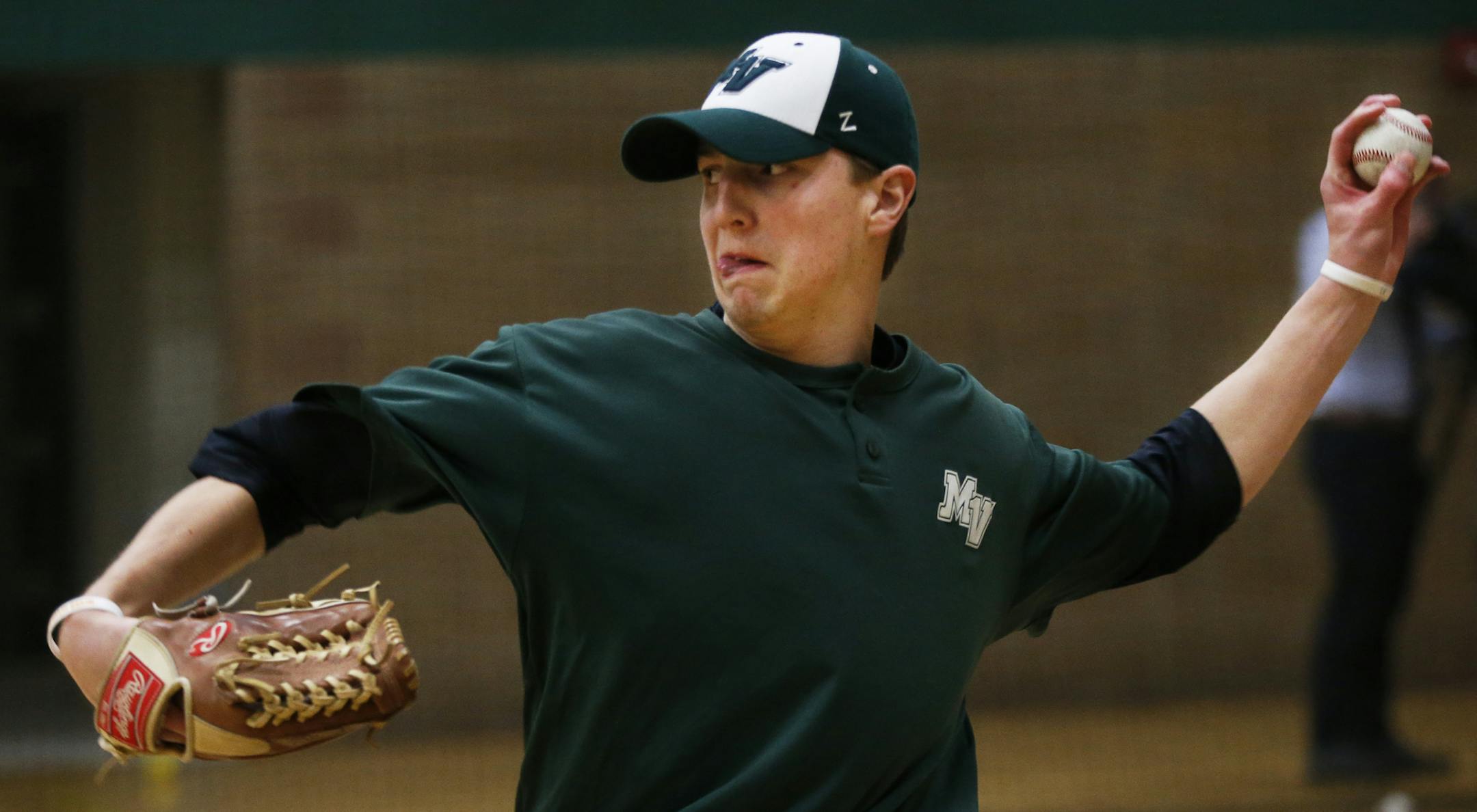 At the Mounds View H.S. baseball practice, pitcher Henry DeCaster is the likely number one pitcher.] Richard Tsong-Taatarii/rtsong-taatarii@startribune.com