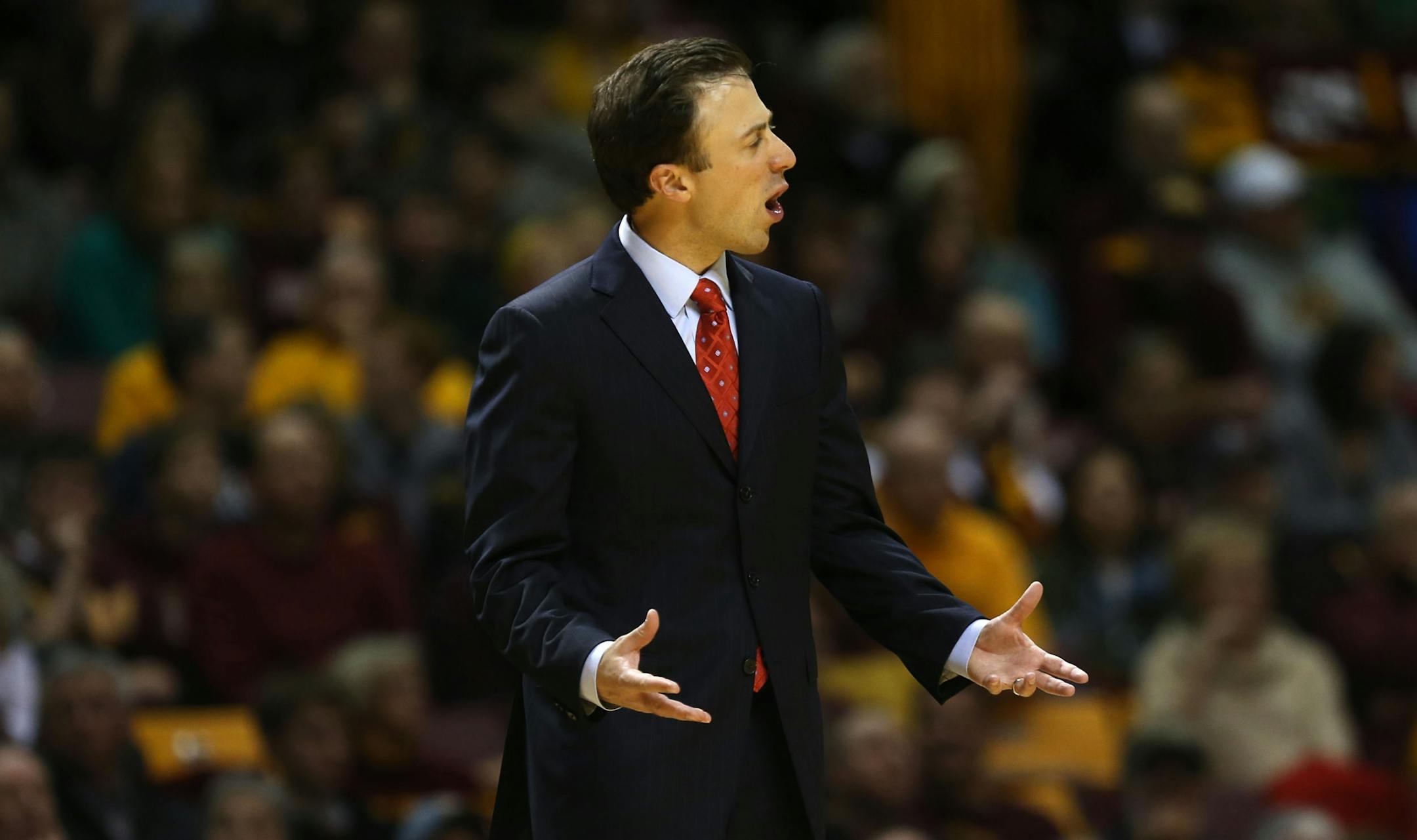 Gophers head coach Richard Pitino yelled instructions to his team during the first half at Williams Arena in Minneapolis Saturday, December 28, 2013.