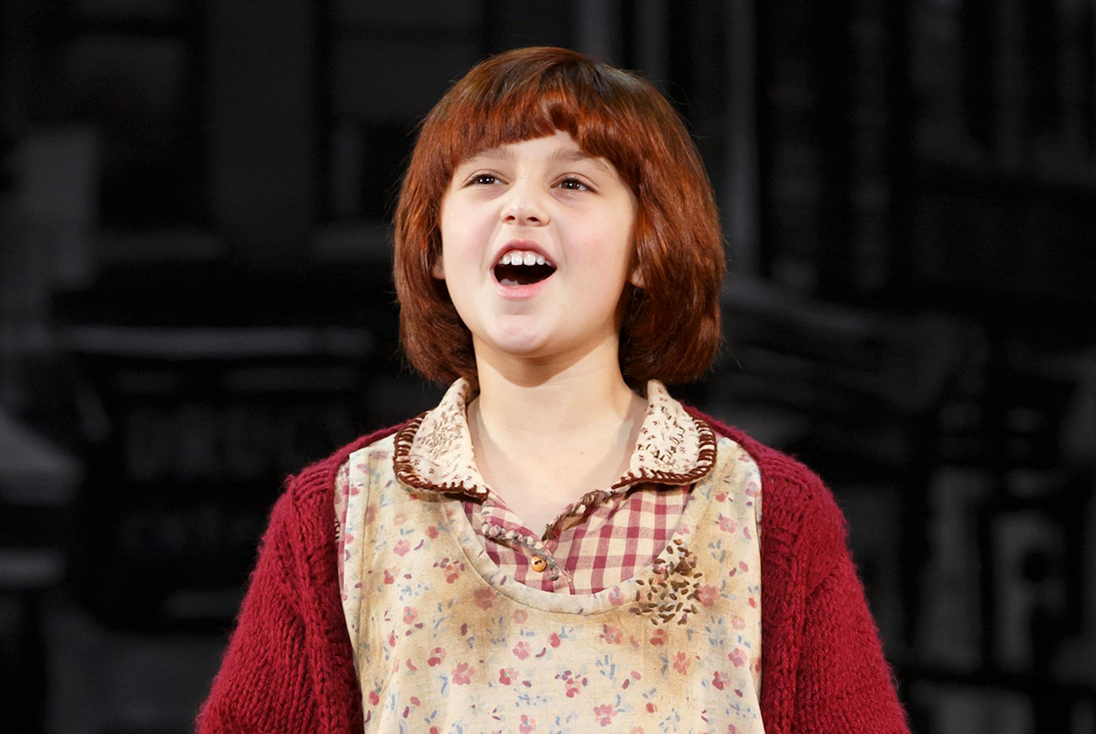 Issie Swickle as Annie, with Sunny as Sandy, performs "Tomorrow" in "Annie." Credit: Joan Marcus