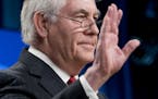 Secretary of State Rex Tillerson waves goodbye after speaking at a news conference at the State Department in Washington, Tuesday, March 13, 2018. Tru