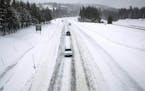 Traffic along I80 while snowfalls at the Donner Pass Road exit Monday, Jan. 9, 2017 in Soda Springs, Calif. A roaring "Pineapple Express" weather syst