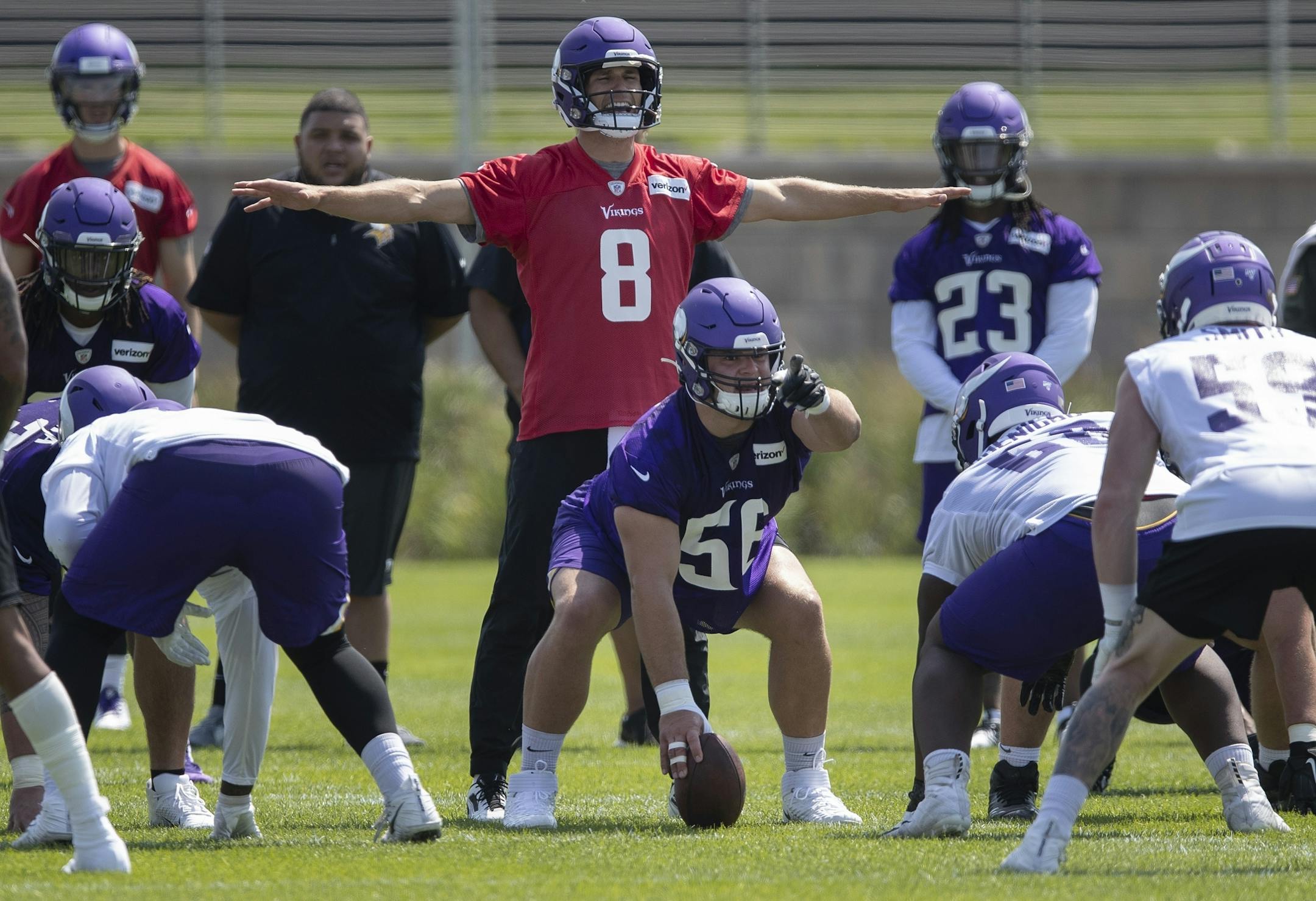 Rookie center Garrett Bradbury prepared to snap the ball to quarterback Kirk Cousins during the first day of training for Vikings rookies at TCO Performance Center Tuesday July,23 2019 in Eagan, MN.