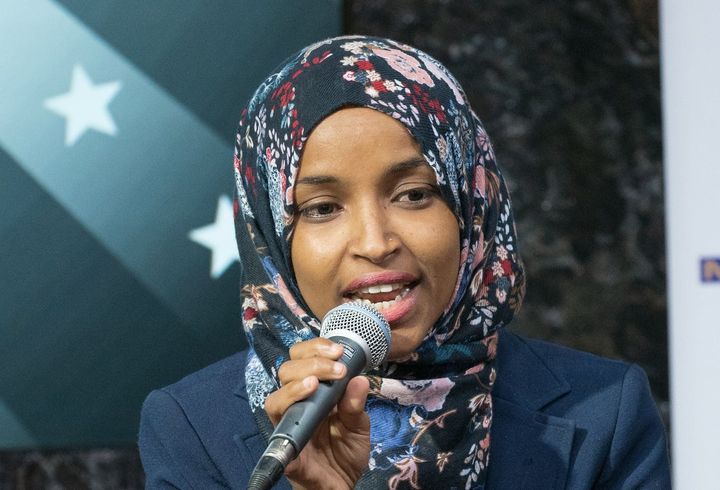 Ilhan Omar spoke at Tuesday's debate in Minneapolis between DFL candidates for Minnesota's Fifth District Congressional seat.