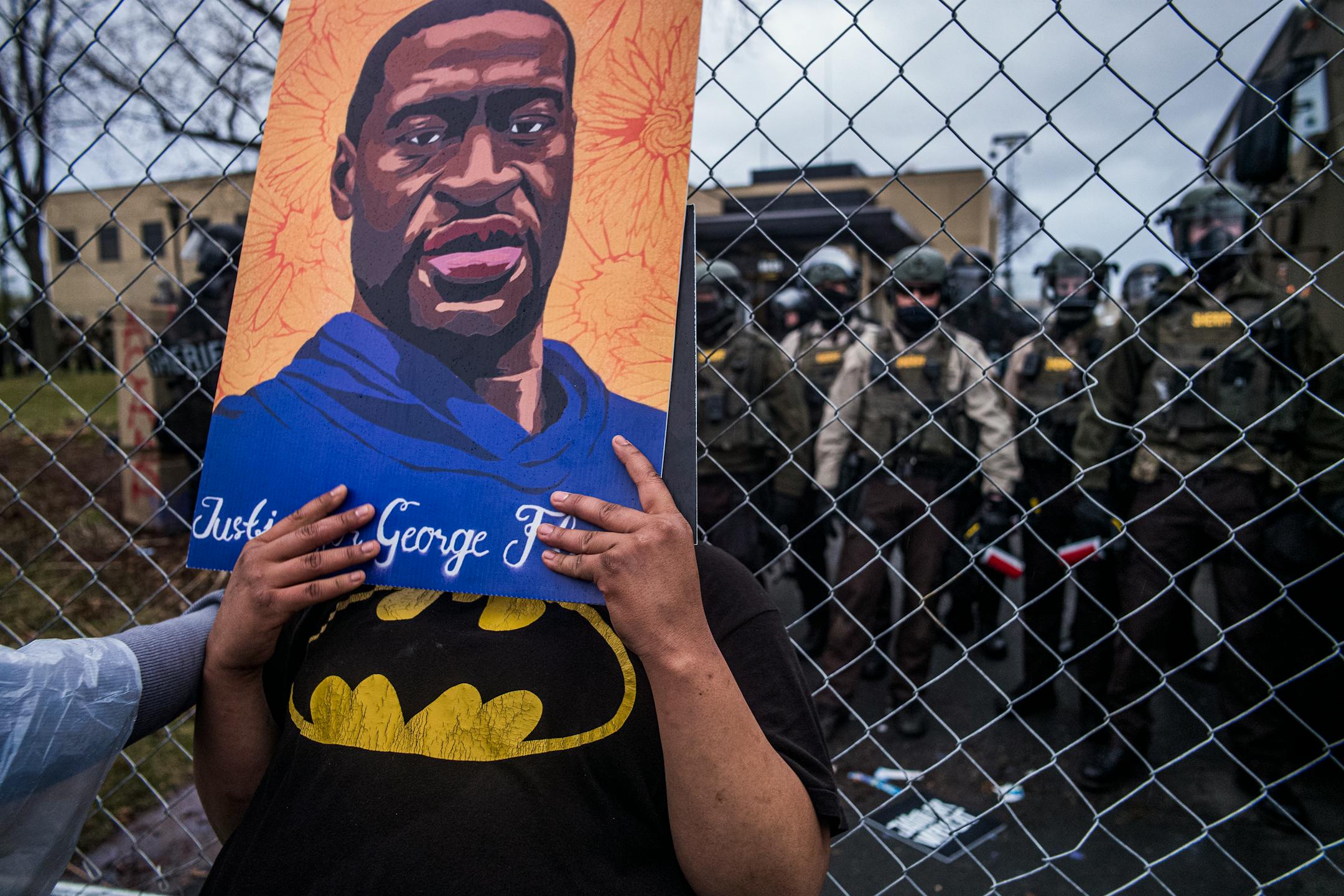 People protest near the Brooklyn Center Police Department in response to the fatal police shooting of Daunte Wright, Wednesday, April 14, 2021 in Brooklyn Center, Minn. Former Brooklyn Center police officer Kimberly Potter was charged with second degree manslaughter after the shooting.