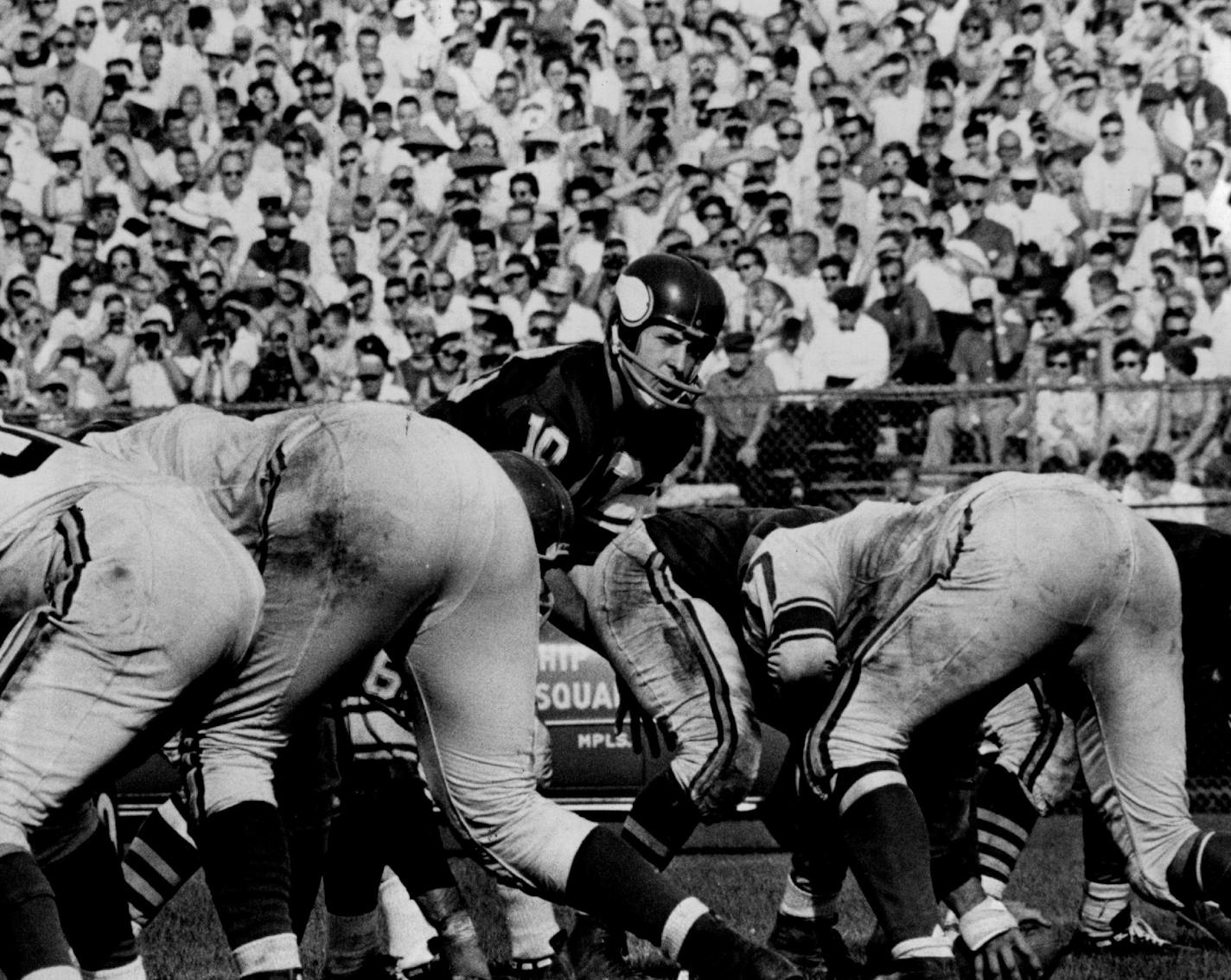 October 26, 1961: Vikings QB Francis Tarkenton probes the defense