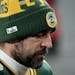 Green Bay Packers quarterback Aaron Rodgers (12) walks off the field after the NFC championship game.