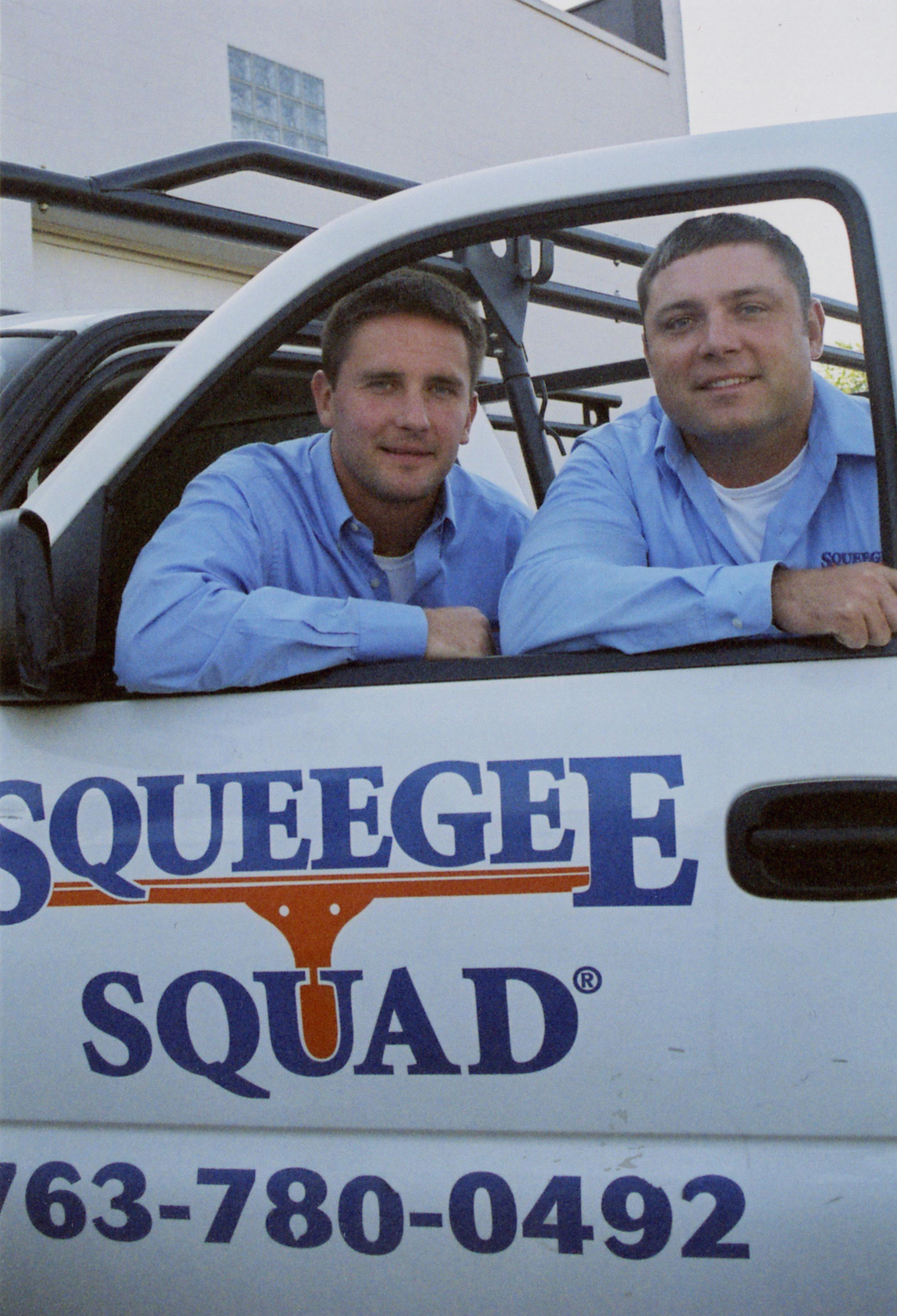 Founder Jack Ruesegger (right) and his brother, Joe, have turned window washing into a $900,000 business they call Squeegee Squad.