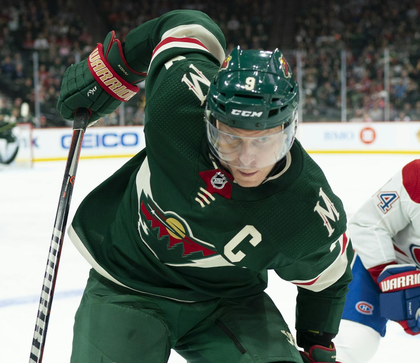 Minnesota Wild center Mikko Koivu (9) brought the puck up ice along the boards while triled by Montreal Canadiens center Nate Thompson (44) in the third period. ] JEFF WHEELER &#x2022; Jeff.Wheeler@startribune.com The Minnesota Wild defeated the Montreal Canadiens 4-3 in an NHL hockey game Sunday afternoon, October 20, 2019 at Xcel Energy Center in St. Paul. ORG XMIT: MIN1910201929596870