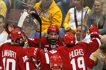 Luke Kunin, center.