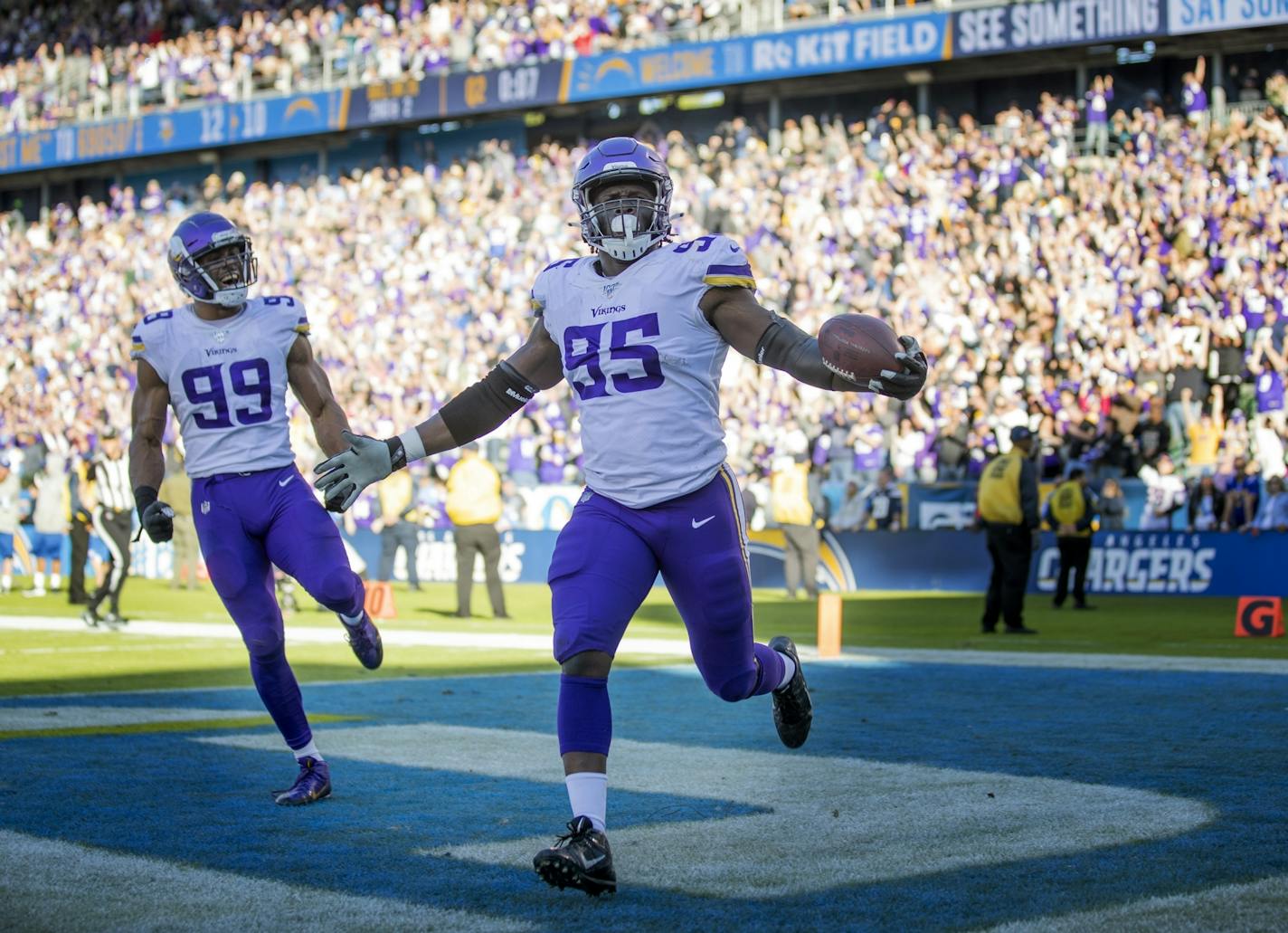 Vikings defensive end Ifeadi Odenigbo (95) celebrated his 56 yard fumble recovery touchdown run .