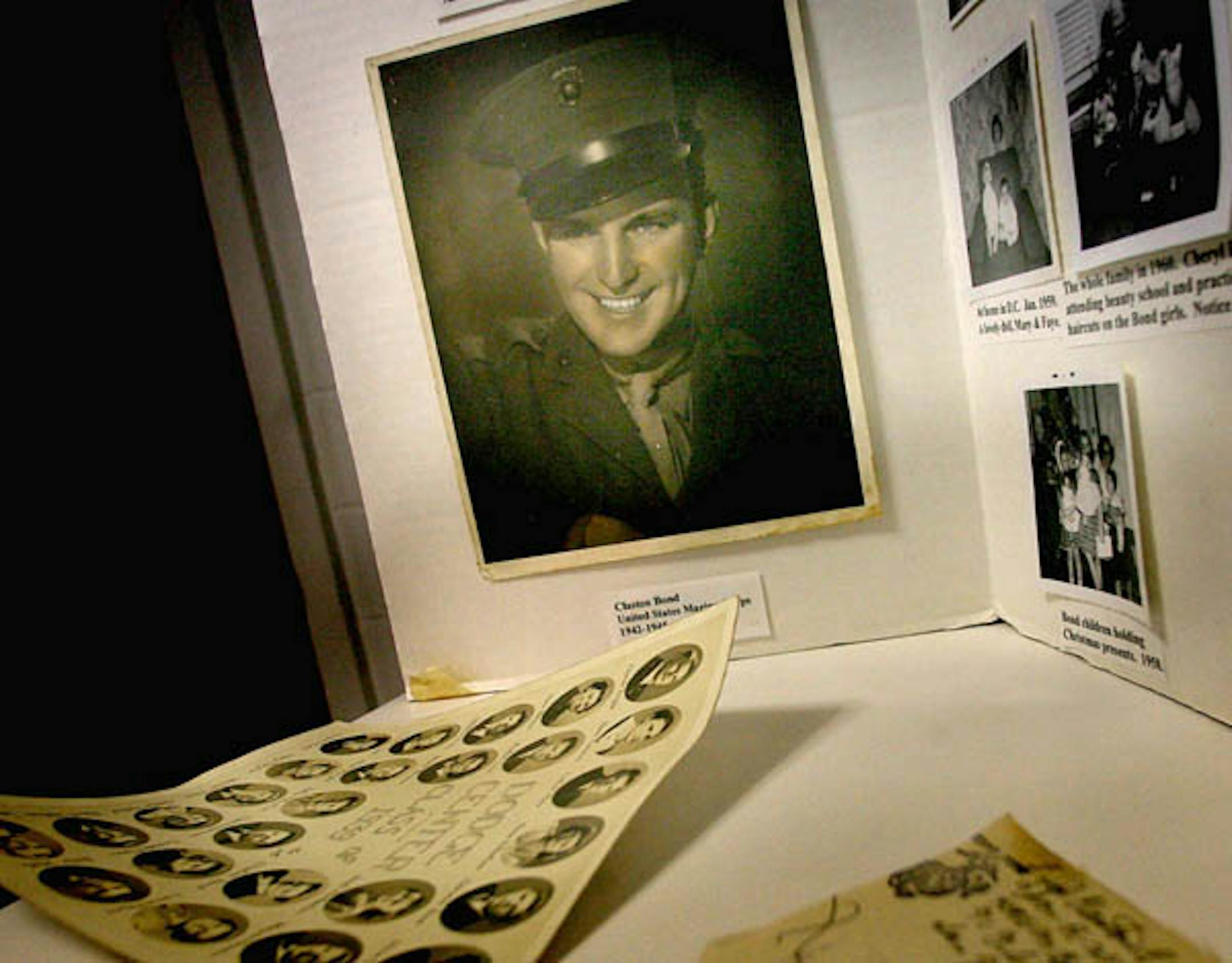 Family photographs, including a wartime photo of Claston E. (Classy) Bond were displayed at the Seventh Day Baptist Church in Dodge Center, site of a funeral service for the WWII veteran.