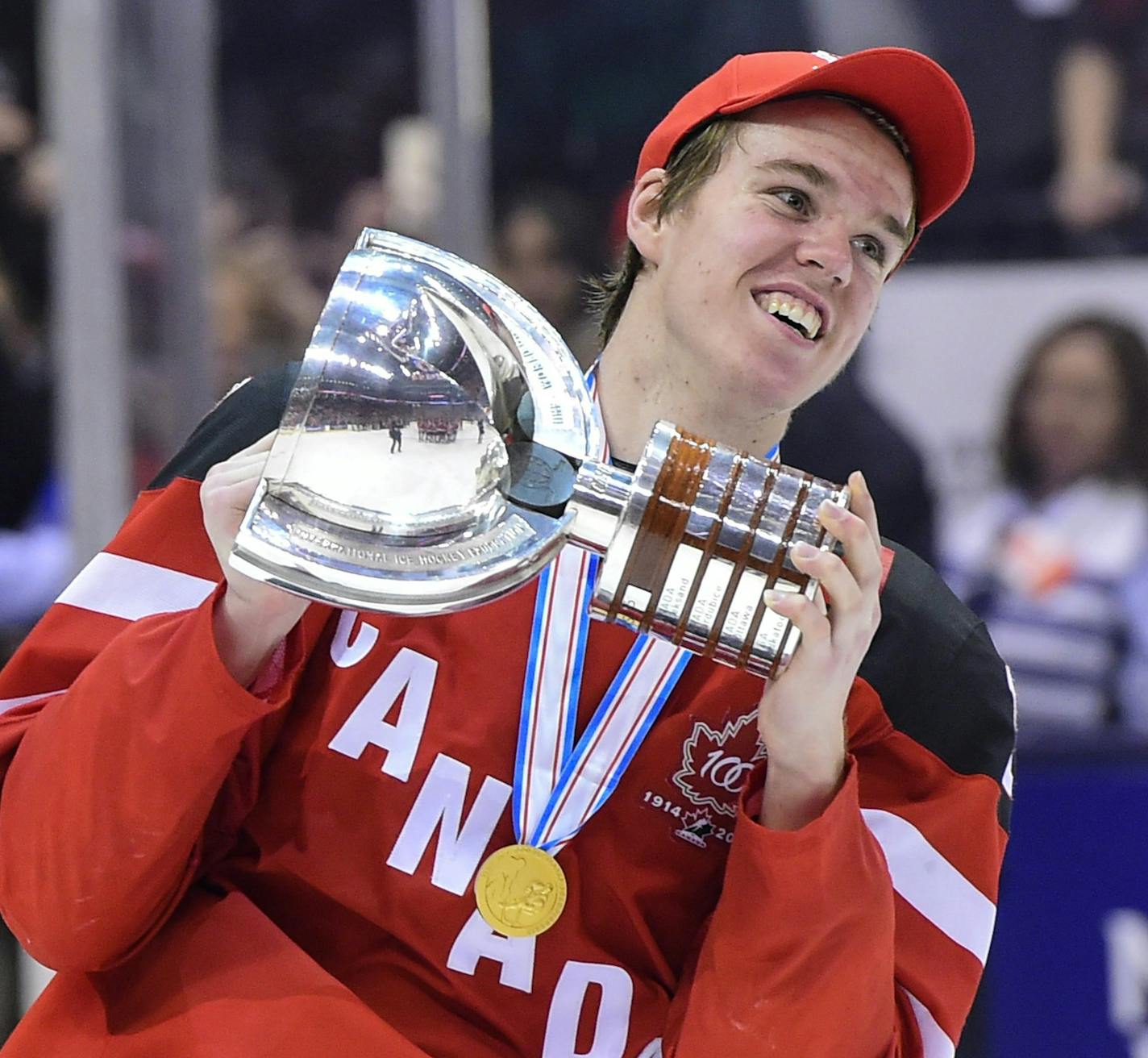 Canada's Connor McDavid skates with the trophy following his team's 5-4 win over Russia in the title game at the hockey World Junior Championship in Toronto on Monday, Jan. 5, 2015. (AP Photo/The Canadian Press, Frank Gunn)