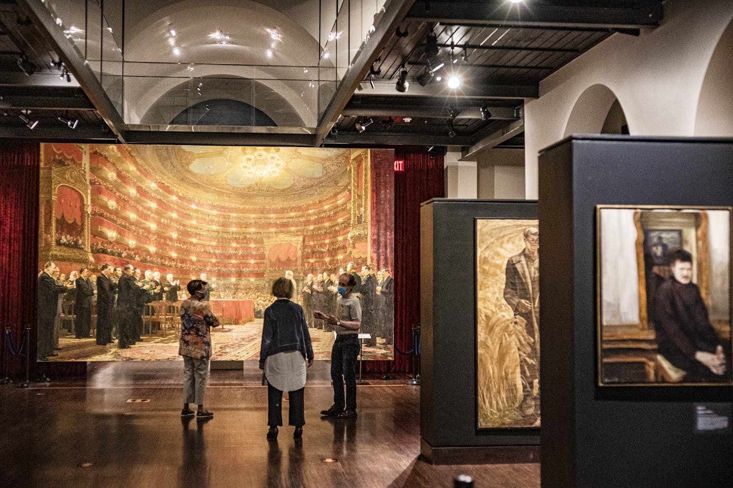 Measures to promote social distancing are evident throughout the museum. This includes a directional path for viewing, distance between groups, and removal of viewing couches.] The Museum of Russian Art (TMORA) is the first major art museum in the Twin Cities to reopen on Monday, June 29, with a new exhibition of Soviet-era paintings from the collection of the late Ukrainian-American lawyer Jurii Maniichuk and his wife Rose Brady. This is a pandemic fresh start for the museum.RICHARD TSONG-TAATA