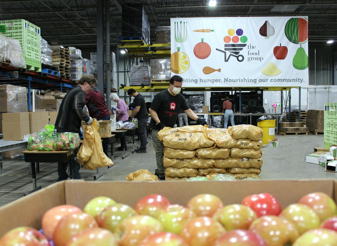 Volunteers from City Church packed 1,300 pounds of harina de maiz (yellow corn flour) for partners at Community Emergency Service. Harina de maiz is a staple for making many culturally connected foods such as tamales, pupusas, arepas and tortillas. (Courtesy Eric Wilson)