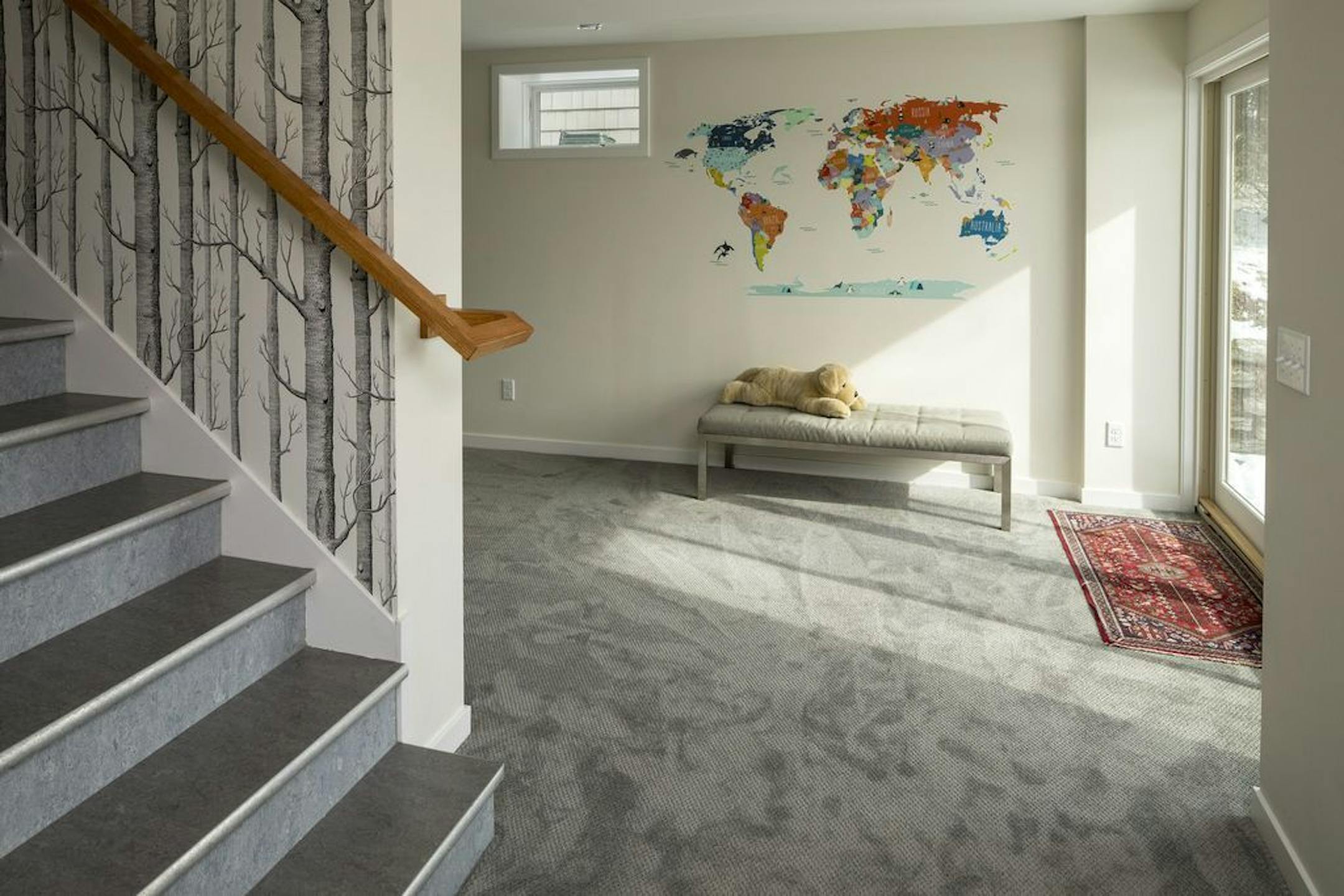 The tuckunder garage was removed and the space was used for part of a walkout basement/family room. repurposed