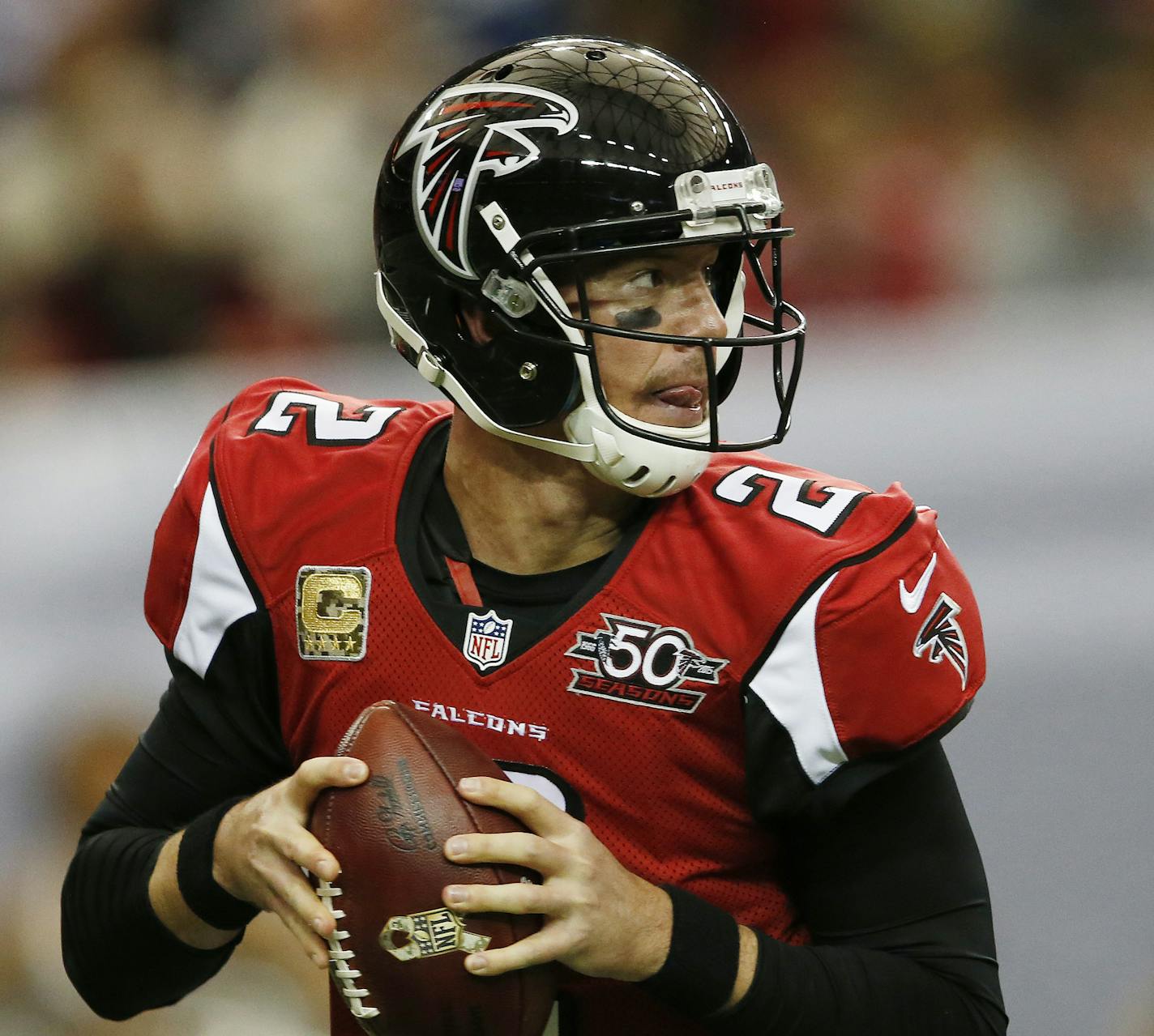 Atlanta Falcons quarterback Matt Ryan (2) works against the Indianapolis Colts during the first of an NFL football game, Sunday, Nov. 22, 2015, in Atlanta. (AP Photo/John Bazemore)