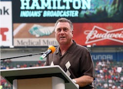 Cleveland Indians radio announcer Tom Hamilton talks after being honored for 25 years of broadcasting, prior to the Indians' baseball game against the