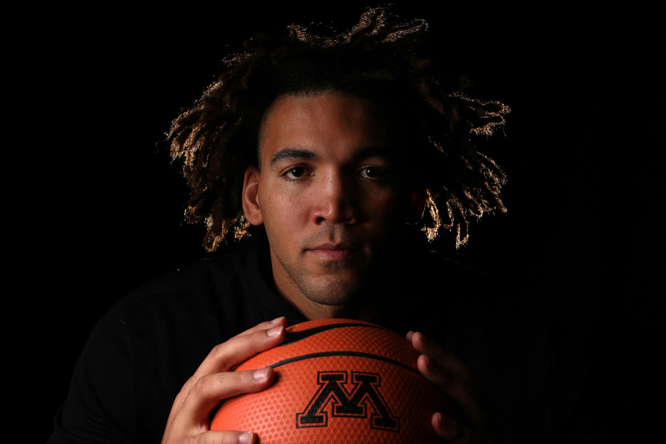 Gophers center Reggie Lynch was the Big Ten's Defensive Player of the Year last season, but realizes he needs to stay out of foul trouble and on the court more this year.
