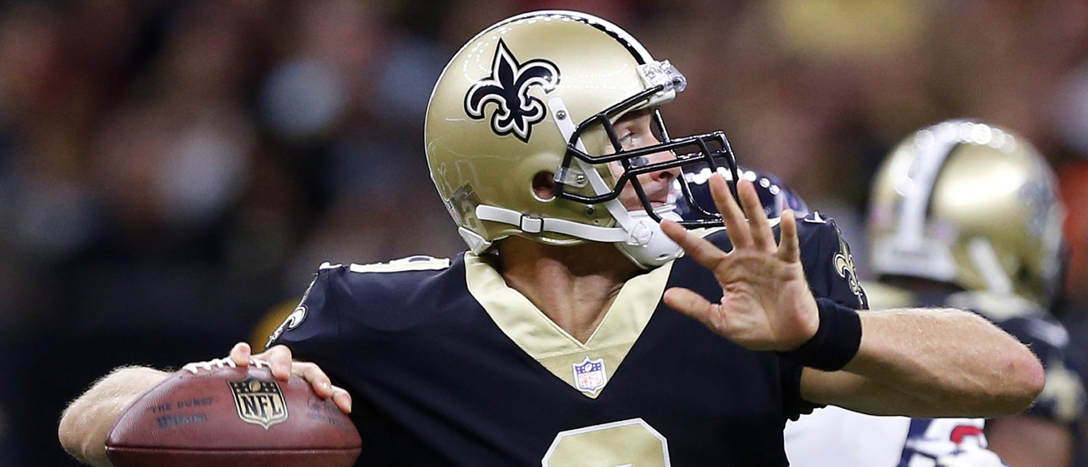 FILE - In this Aug. 26, 2017, file photo, New Orleans Saints quarterback Drew Brees (9) drops back to pass in the first half of a preseason NFL football game against the Houston Texans, in New Orleans. The Saints play their first game of the season on Sept. 11 at Minnesota. (AP Photo/Butch Dill)
