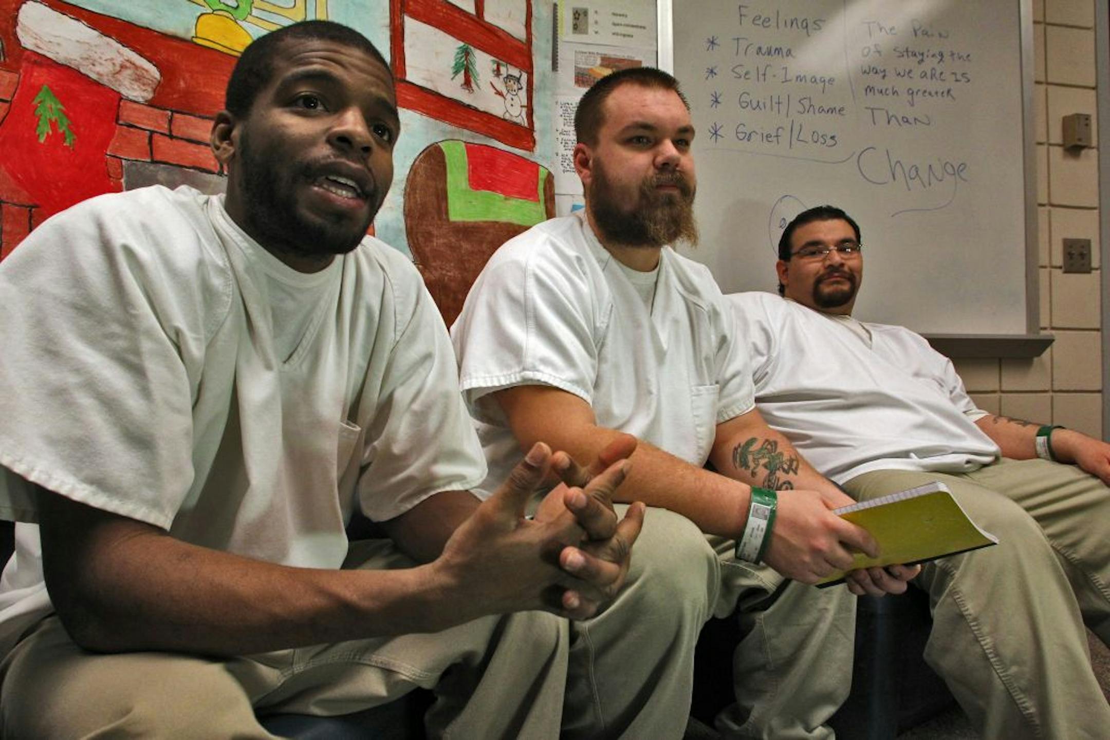 From left, Eric Brown, Scott Bestler and Frank Rodriguez and the other inmates at the Dakota County jail received small packages with cards to send as well as snacks and a small Bible.
