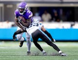 Minnesota Vikings running back Cam Akers (31) attempts to avoid a tackle in the third quarter.