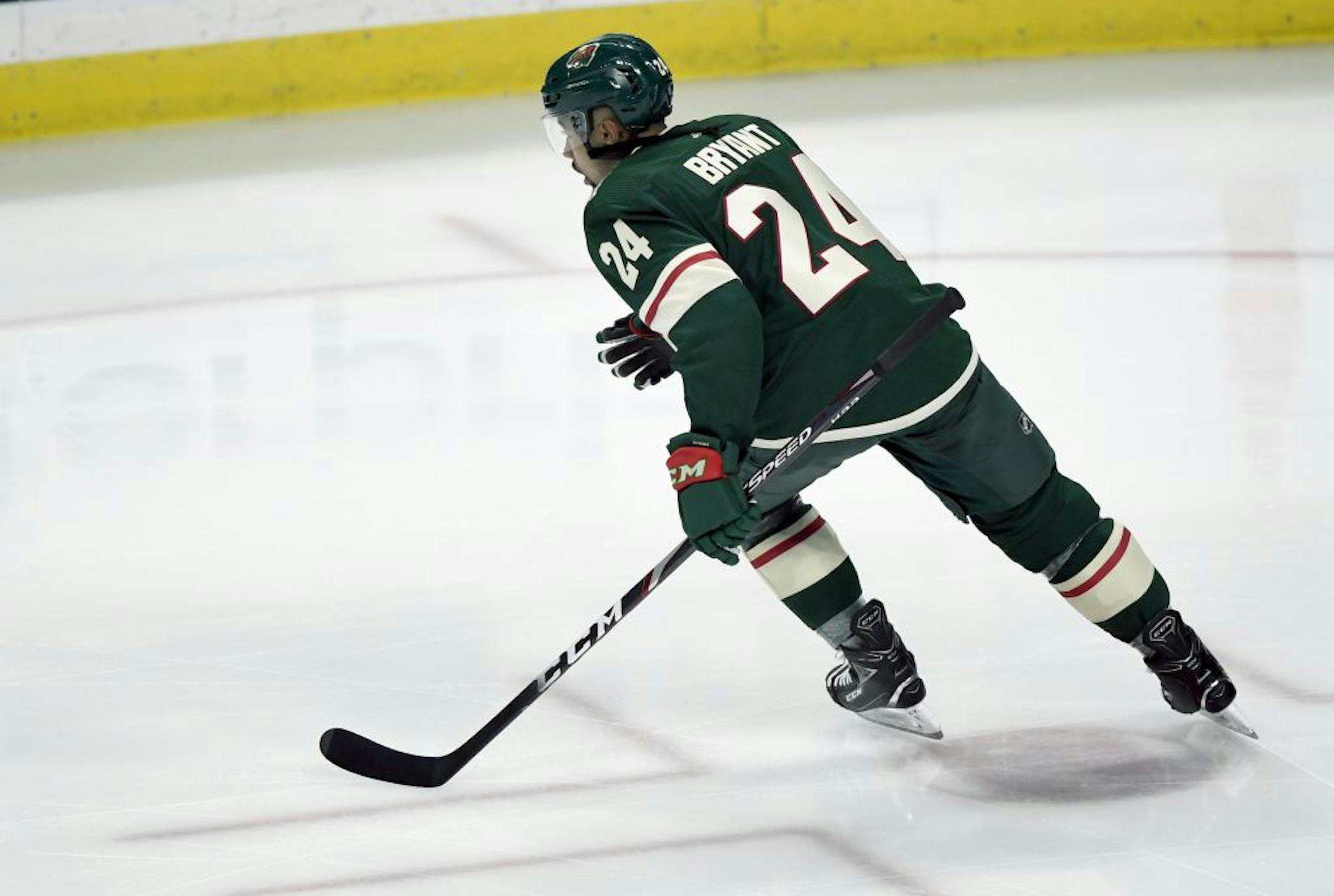 Minnesota Wild's Matt Dumba (24) wears a Bryant sweater to honor the late Kobe Bryant as he warms up against the Boston Bruins before an NHL hockey game Saturday, Feb. 1, 2020, in St. Paul, Minn.