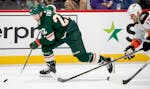 Kevin Fiala (22) of the Minnesota Wild skated with puck in the second period.