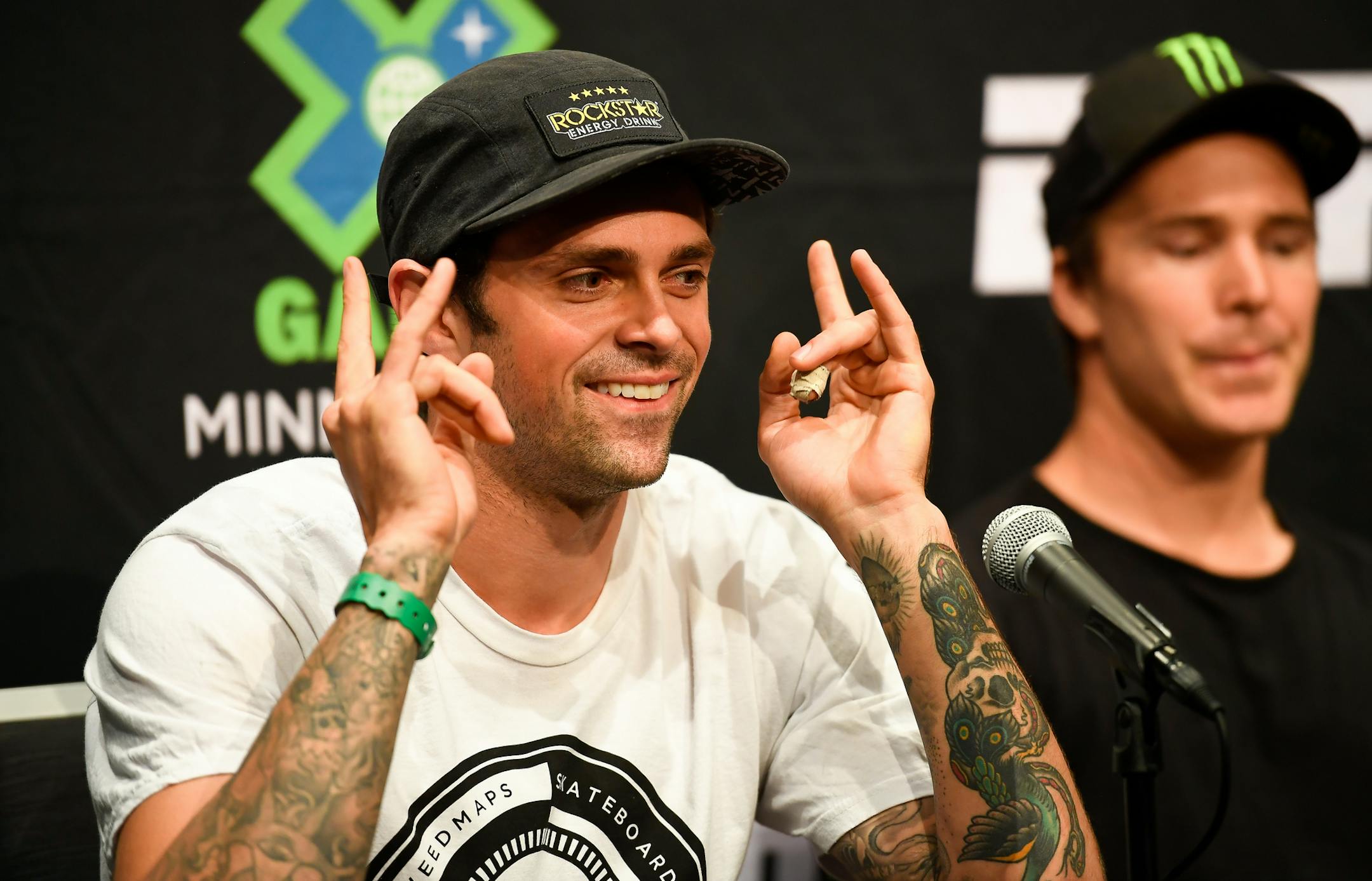 Defending big air gold medalist Elliot Sloan gestured to attendees of Wednesday afternoon's athletes panel as he was introduced along with other panelists. Sloan has medaled nine times in twelve X Games appearances and will also DJ an opening set before Zedd's performance Sunday. ] AARON LAVINSKY &#xef; aaron.lavinsky@startribune.com An X Games athletes panel was held Wednesday, July 18, 2018 at US Bank Stadium in Minneapolis, Minn.