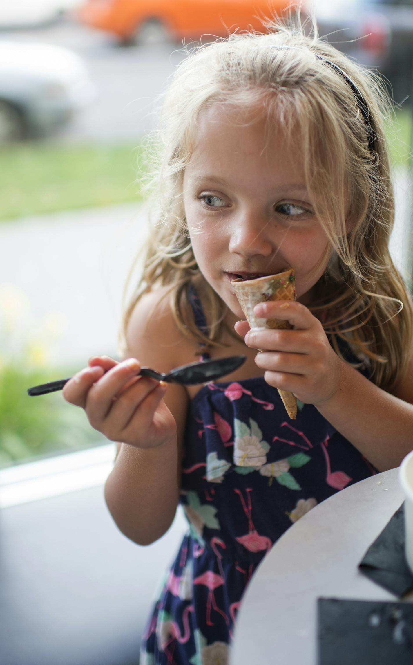 Harper Mitchelides, 5, bit into her ice cream cone at Milkjam on Thursday. ] Isaac Hale &#xef; isaac.hale@startribune.com Milkjam, located at 2743 Lyndale Ave S and run by Saffron chef Sameh Wadi, draws so many people that there's frequently a line out the door. Crowds came for ice cream on Thursday, July 7, 2016.