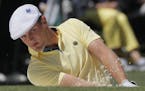 Amateur Bryson DeChambeau hits out of a bunker of the second hole during the second round of the Masters golf tournament Friday, April 8, 2016, in Aug
