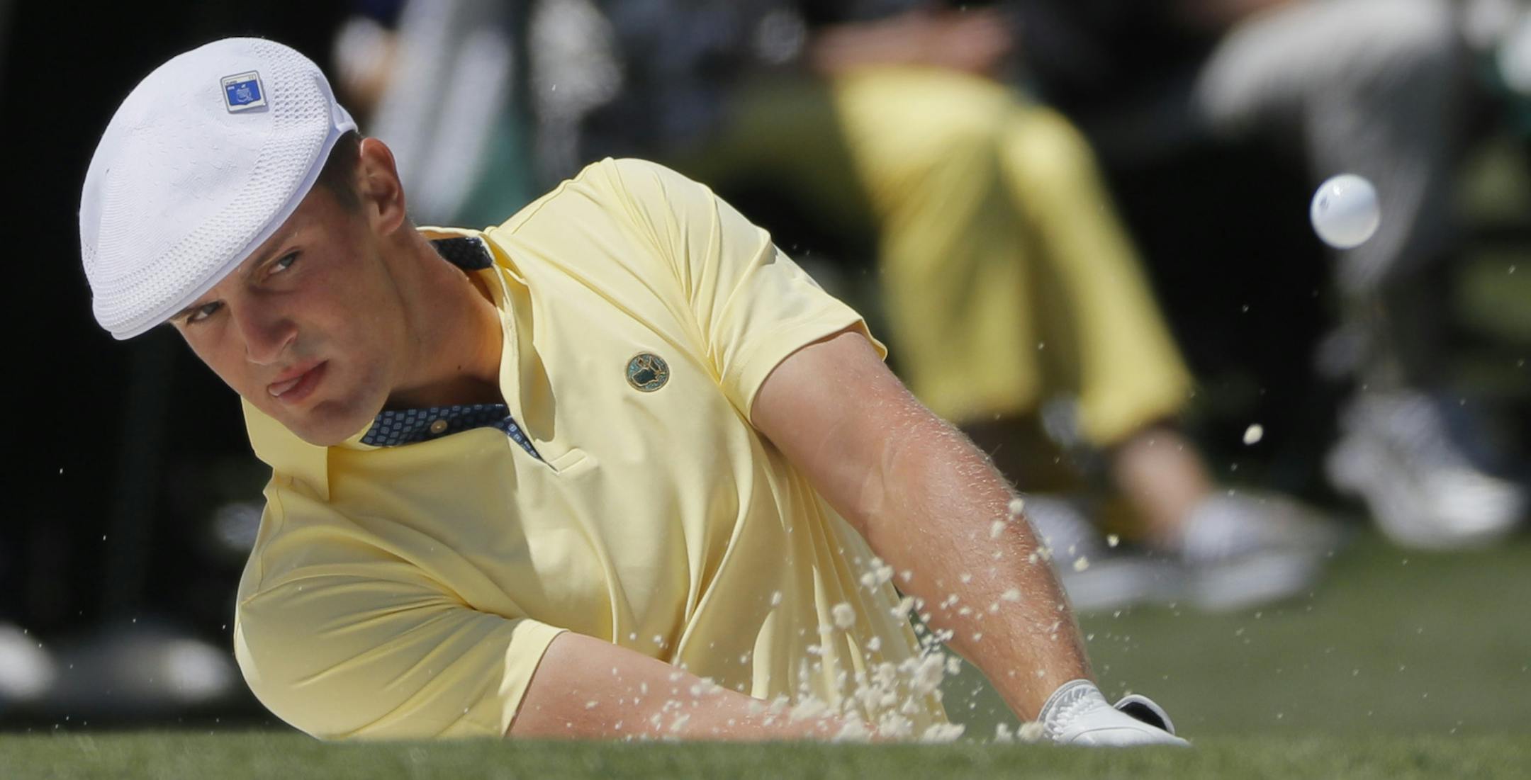 Amateur Bryson DeChambeau hits out of a bunker of the second hole during the second round of the Masters golf tournament Friday, April 8, 2016, in Augusta, Ga. (AP Photo/Jae C. Hong)