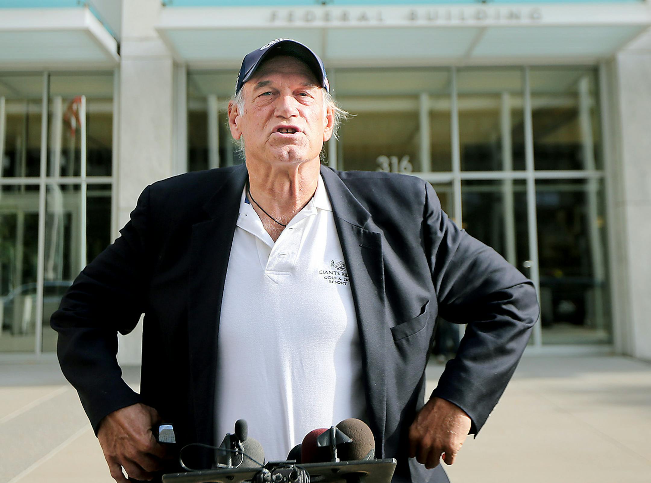 Former Governor Jesse Ventura talked to reporters at the Warren E. Burger Federal Building and United States Courthouse after the defamation hearing, Tuesday, October 20, 2015 in St. Paul, MN.
