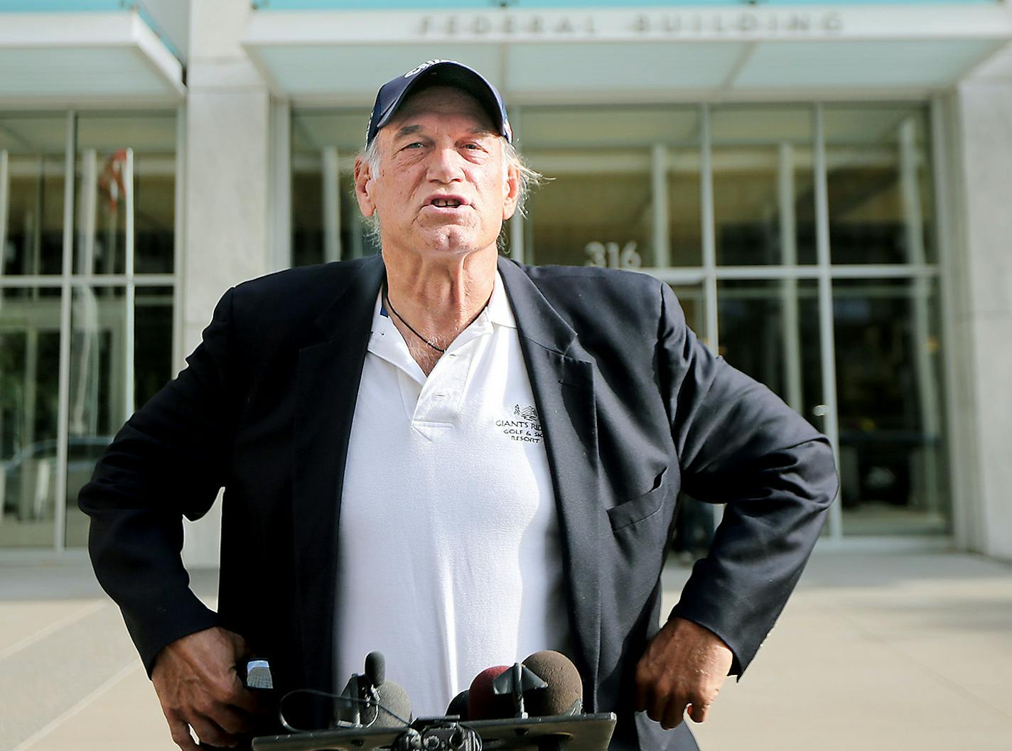 Former Governor Jesse Ventura talked to reporters at the Warren E. Burger Federal Building and United States Courthouse after the defamation hearing, Tuesday, October 20, 2015 in St. Paul, MN.