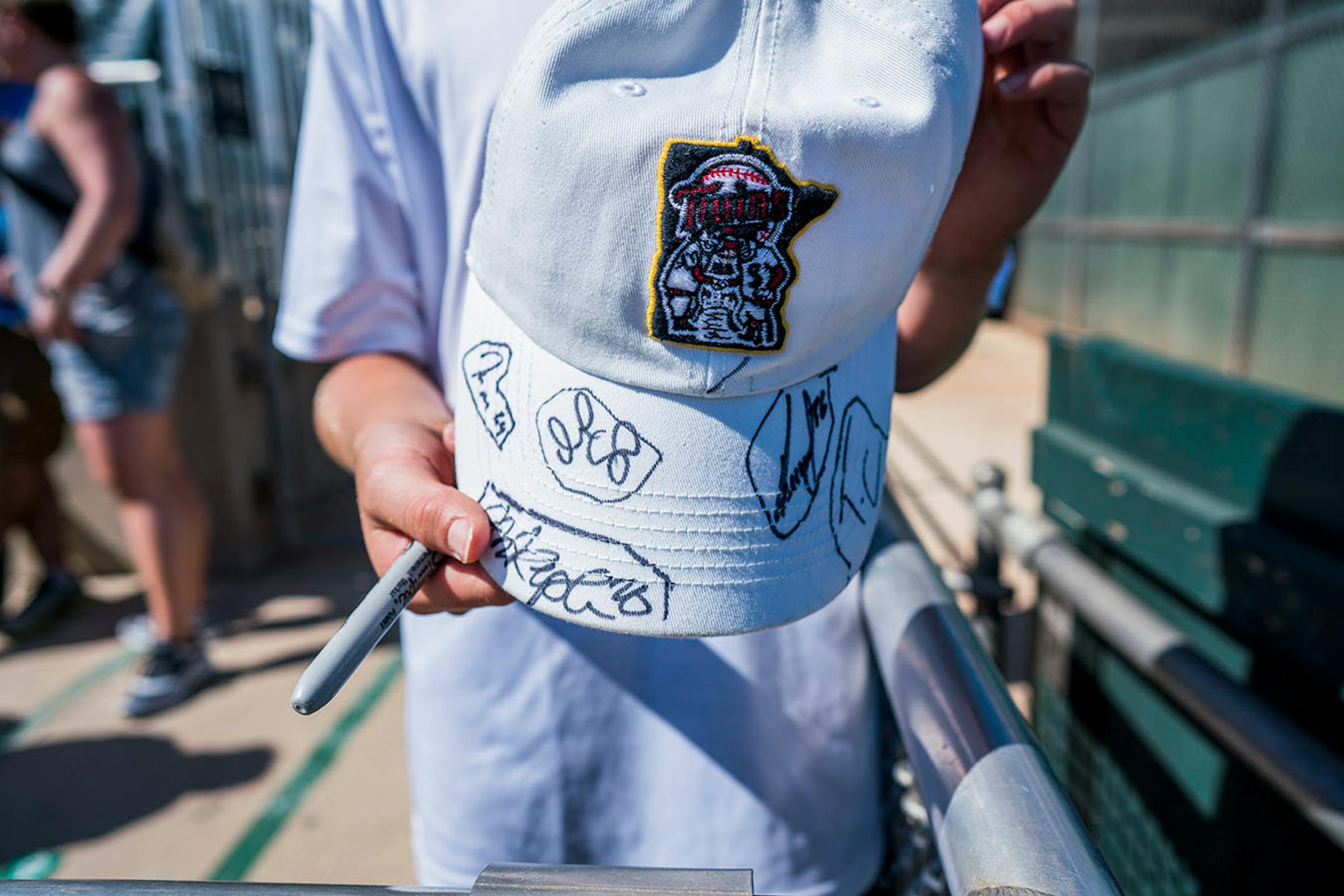 Nine-year-old Hunter Babb showed off his newly autographed cap.