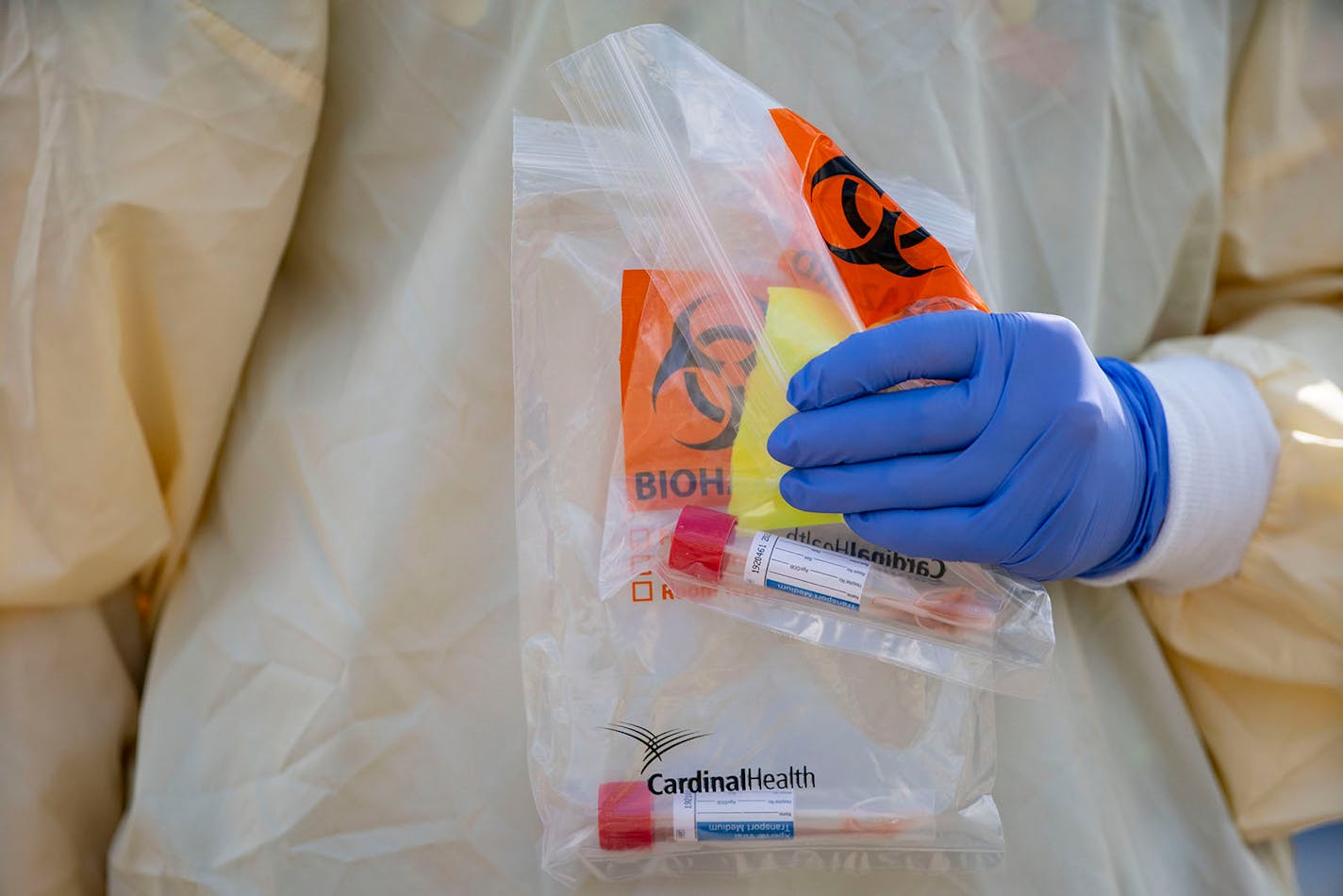 Medical Assistant Courtney Banks walked back towards St. Luke's Miller Creek Medical Clinic in Duluth, MN on Monday after administering a pair of COVID-19 tests at their drive up testing site