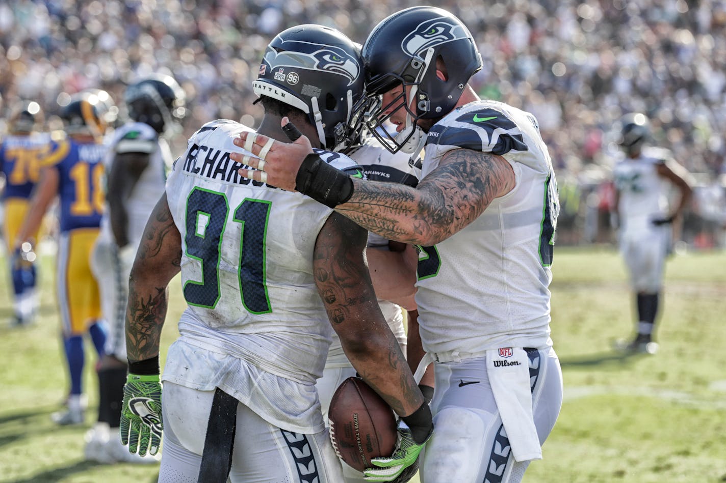 Seattle Seahawks center Justin Britt congratulated defensive lineman Sheldon Richardson after he recovered a fumble vs. the Los Angeles Rams in October.