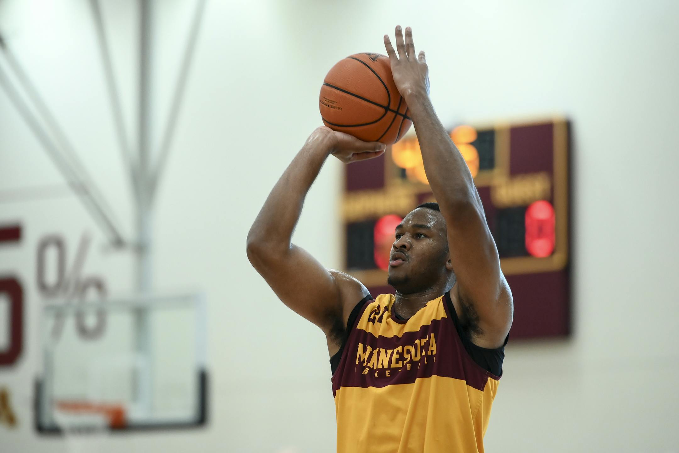 Gophers forward Eric Curry (24) attempted a basket during practice Tuesday. ] Aaron Lavinsky • aaron.lavinsky@startribune.com The Gophers men's basketball team held a practice, as well as a press conference by head coach Richard Pitino, on Tuesday, Sept. 24, 2019 at the University of Minnesota Athletes Village in Minneapolis, Minn.