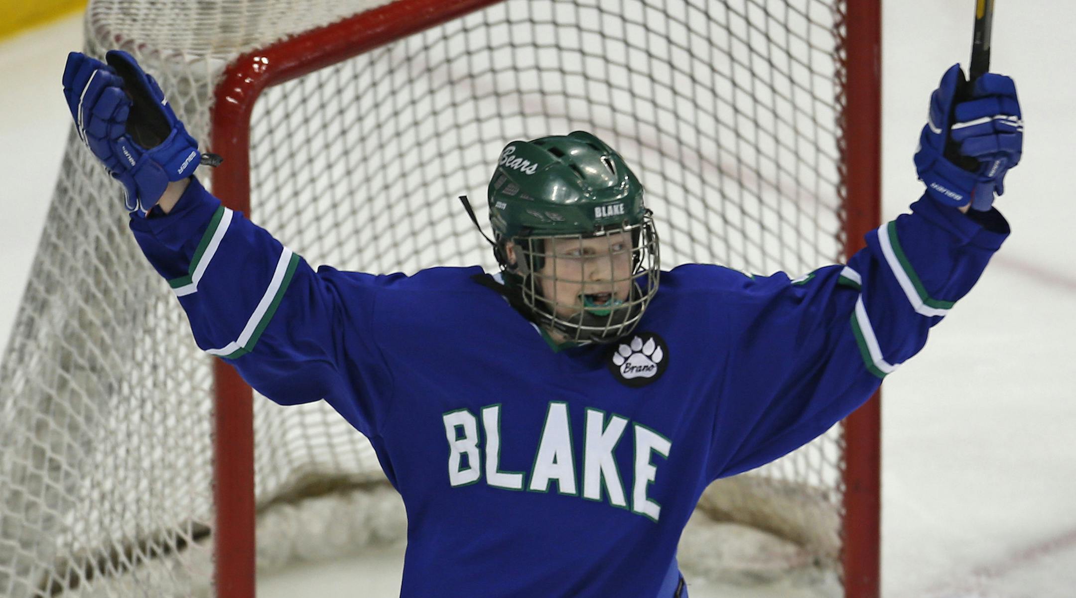 Minnesota State Girls Hockey Tournament Class 1A Semifinalsfinals, The Blake School vs. Red Wing 2/22/13. (left to right) Blake's Karlie Lund celebrated her third goal for the hat trick in 3rd period action against Red Wing.] Bruce Bisping/Star Tribune bbisping@startribune.com Karlie Lund/roster. ORG XMIT: MIN1302221338490763